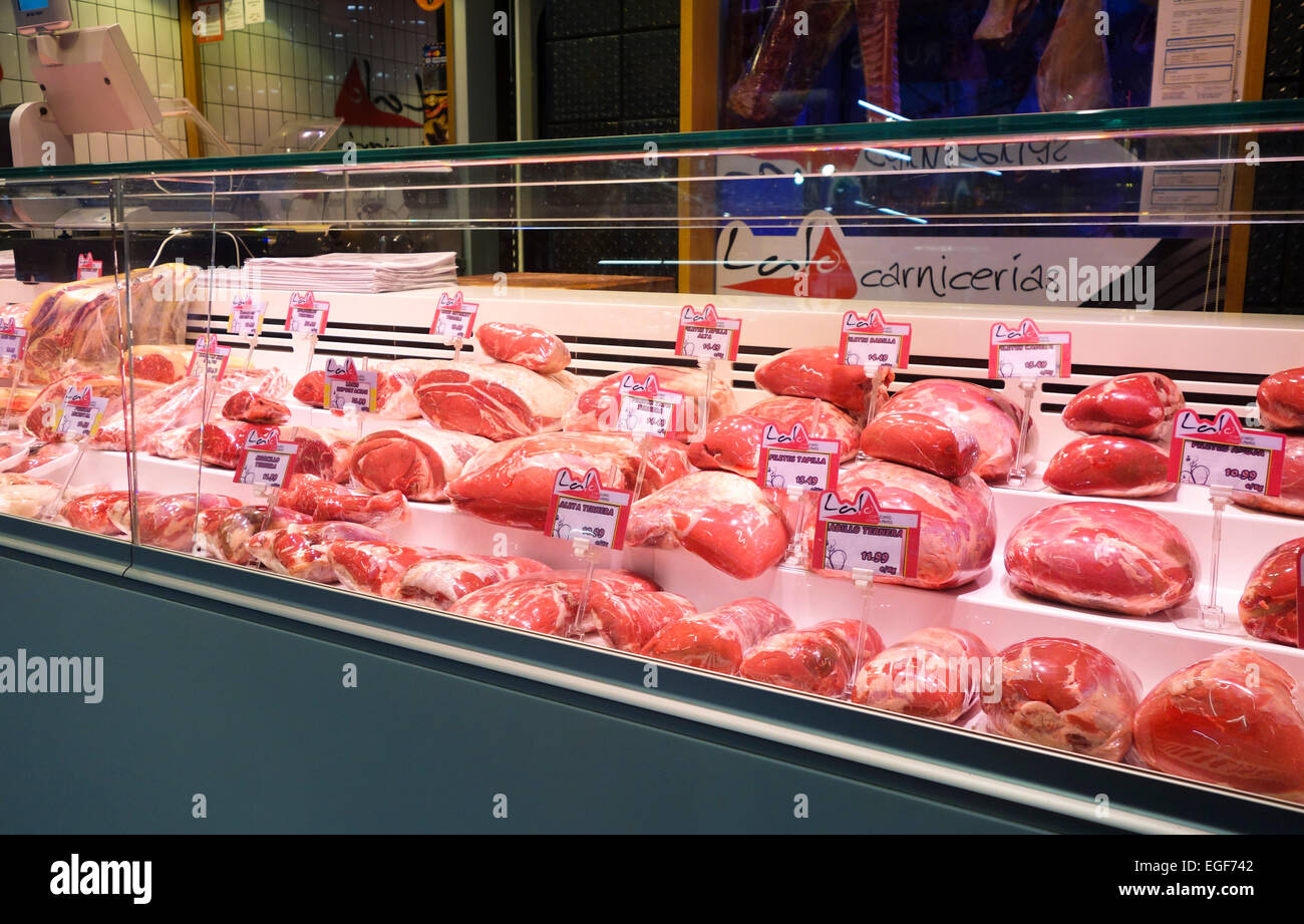 Meat at display at butcher in Mercado San Anton covered market, Madrid