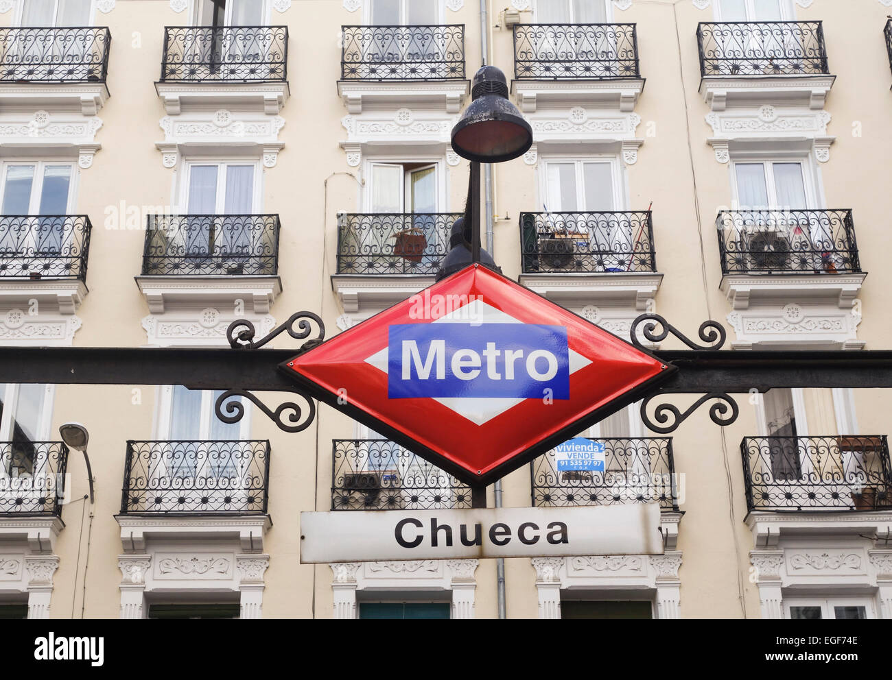 Vintage Metro sign at entrance Chueca subway, Madrid, Spain. Stock Photo