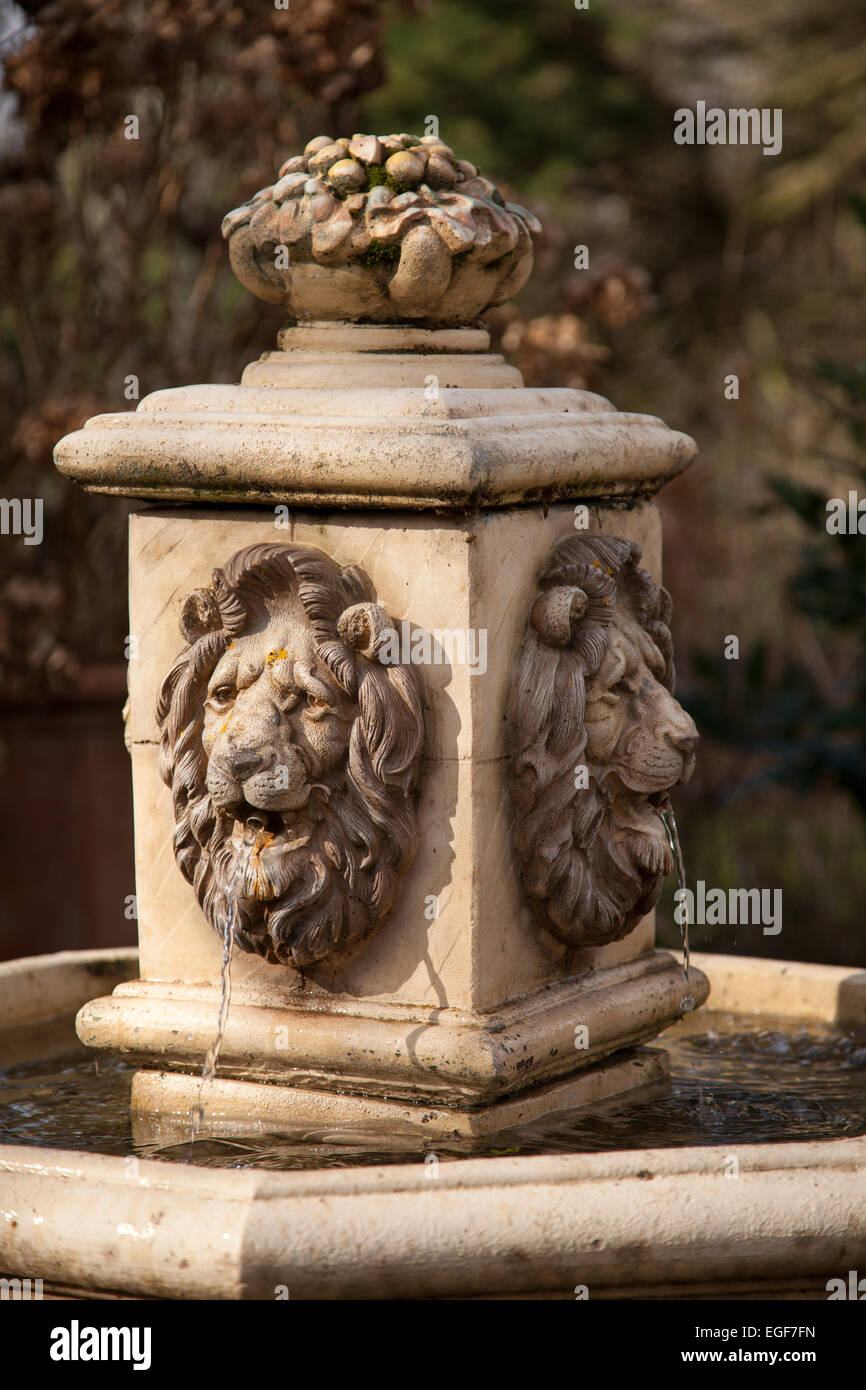 Lions head classic garden fountain, stone effect Stock Photo - Alamy