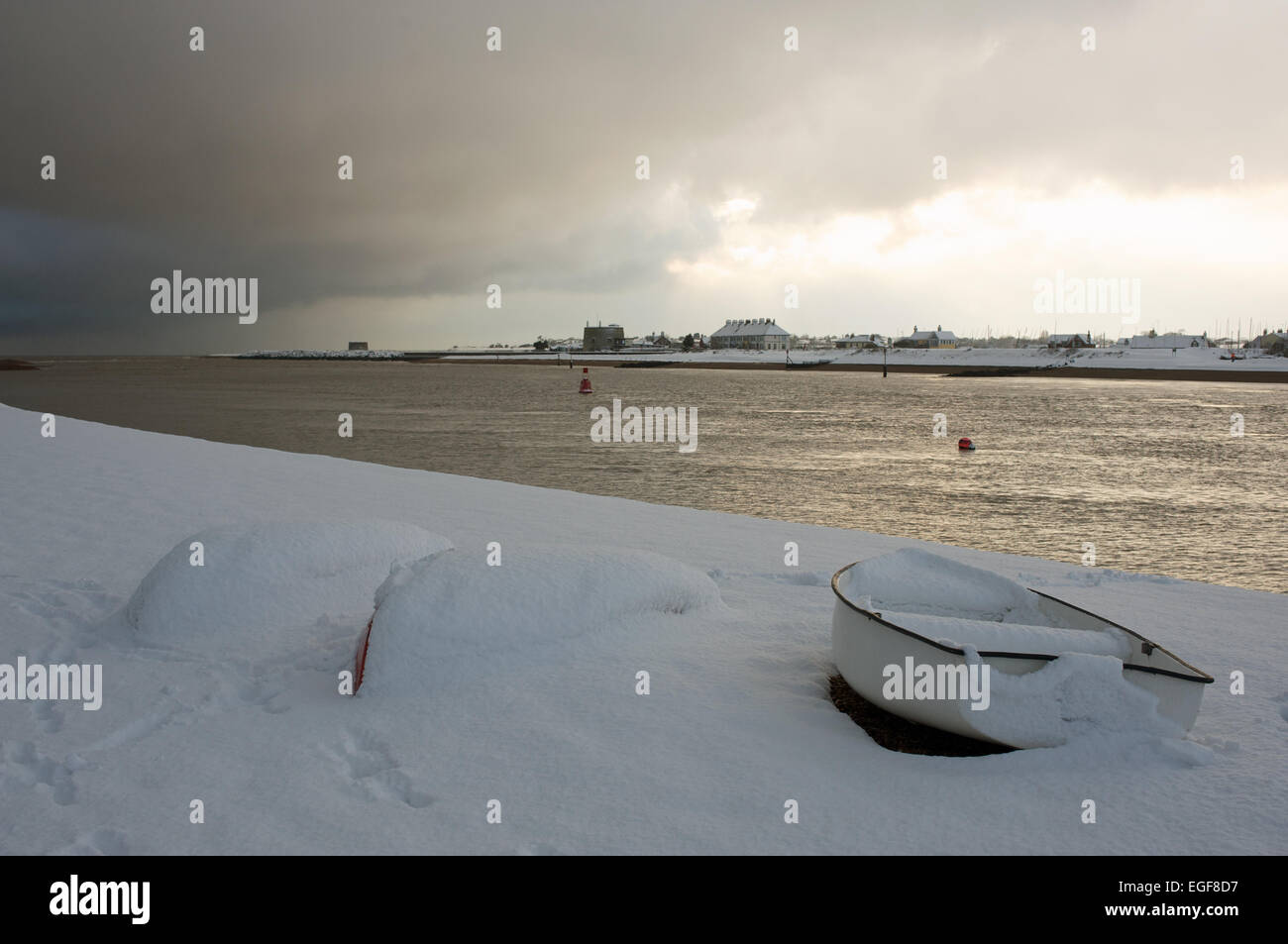 Snow covering the beach at Bawdsey Ferry, Suffolk, UK. Stock Photo