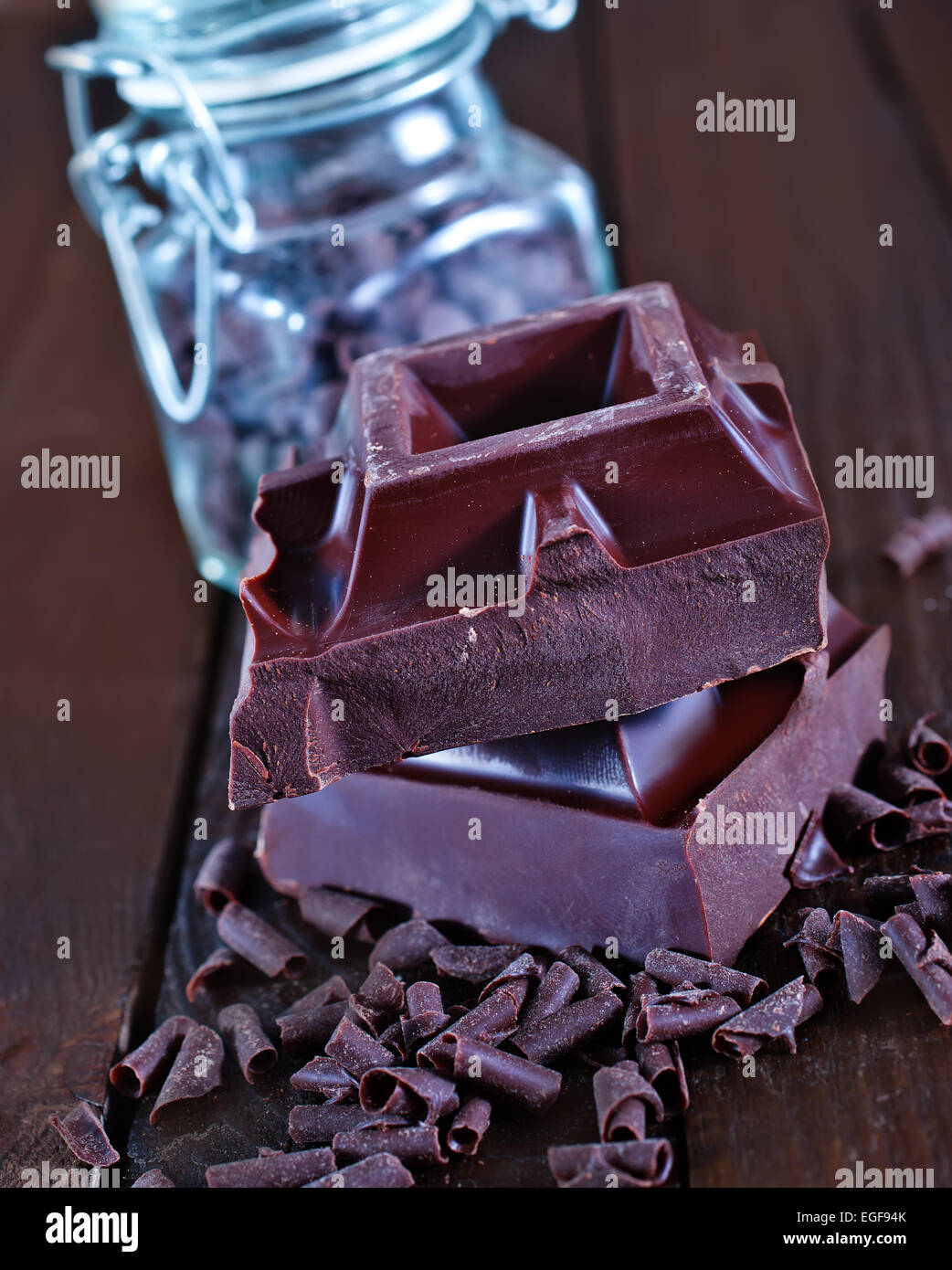 chocolate on the wooden table, chocolate background Stock Photo - Alamy