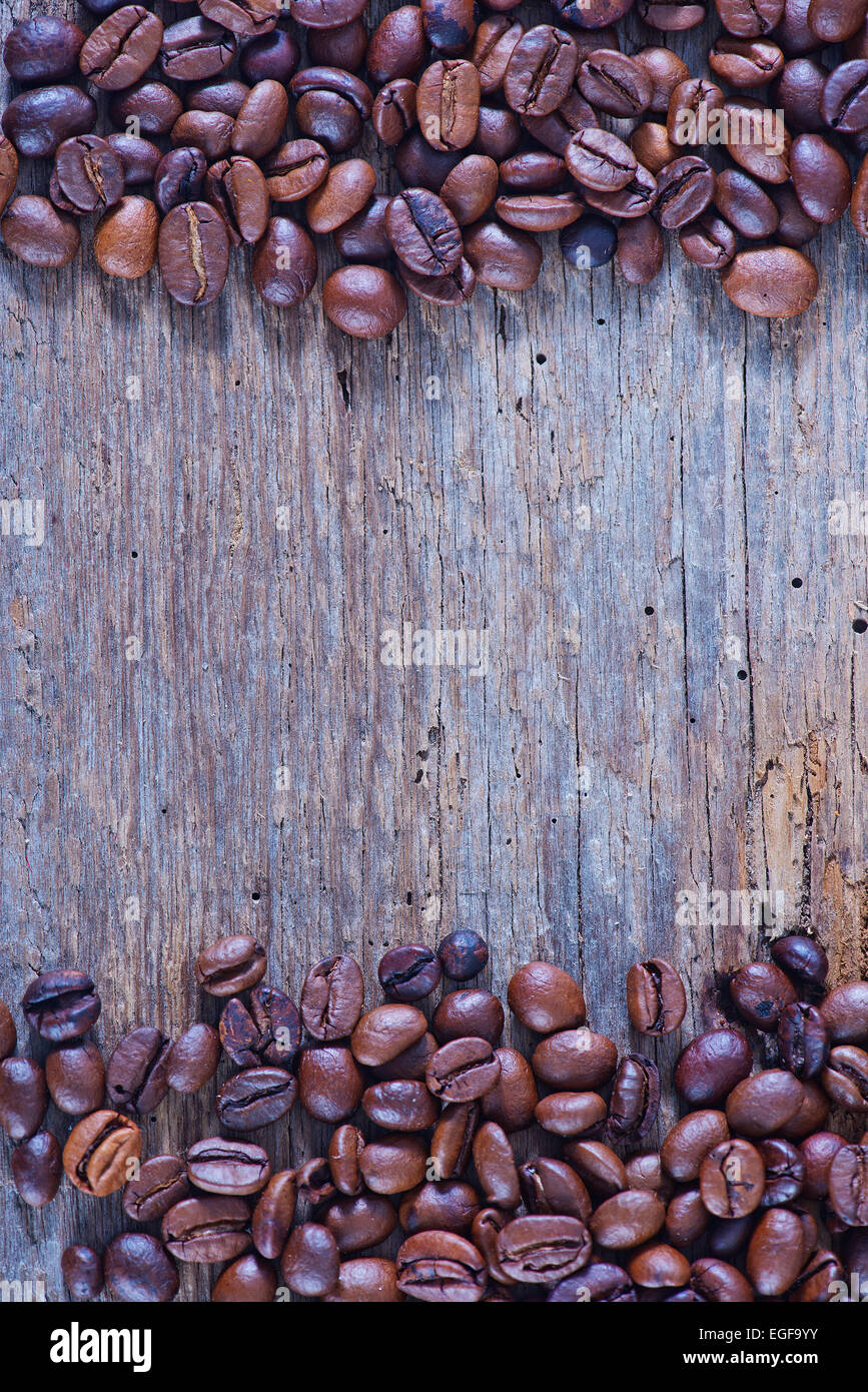 dry coffee beans on the wooden table Stock Photo Alamy