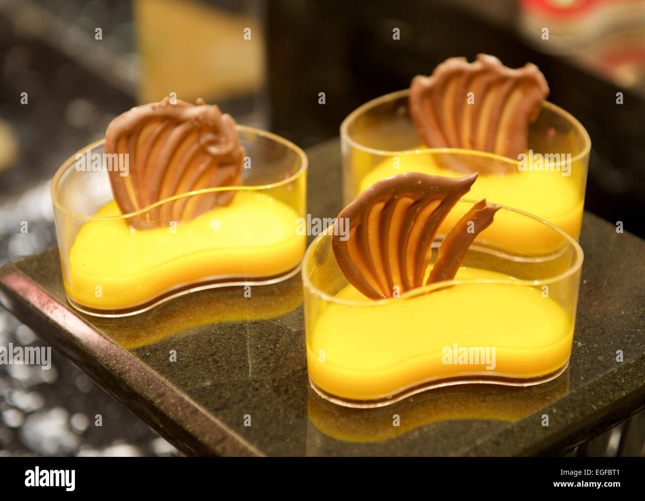 Mango cream Chocolate dessert in buffet restaurant Stock Photo Alamy