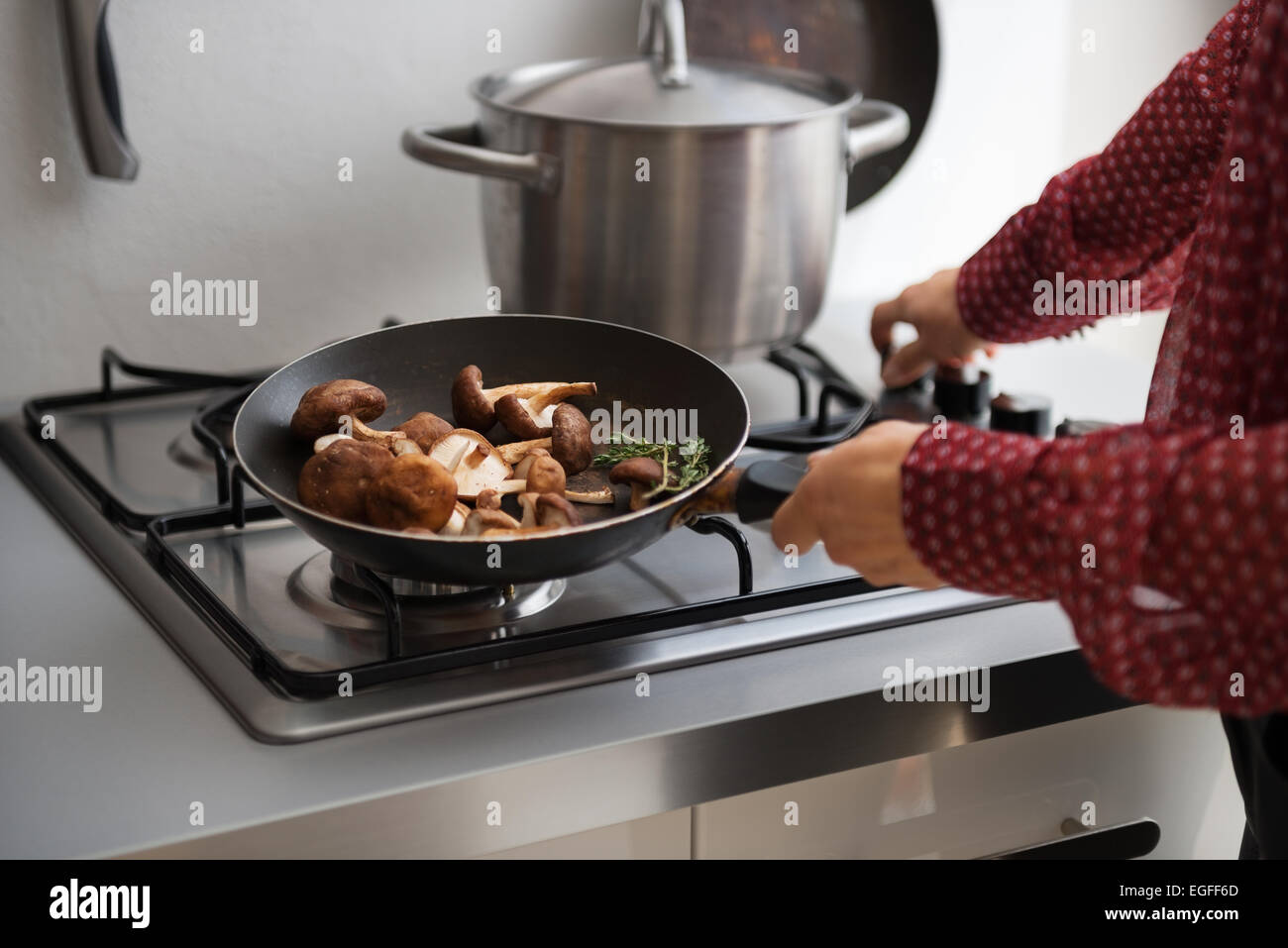 Close up young woman frying hi-res stock photography and images - Alamy