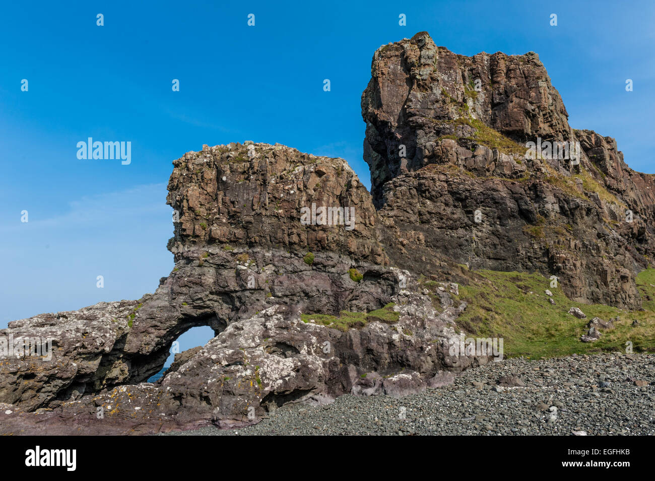 Sea Cliffs and Natural Arch at Port Haunn Stock Photo