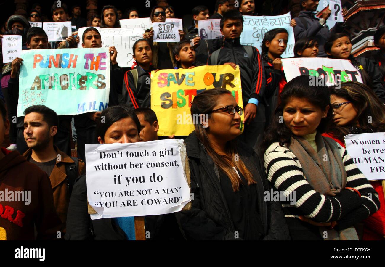 (150224) -- KATHMANDU, Feb. 24, 2015 (Xinhua) -- Participants hold placards during a protest against an acid attack by an unidentified person on two school children, Sangita Magar and her friend Sima Basnest, in Kathmandu, Nepal, Feb. 24, 2015. (Xinhua/Sunil Sharma) Stock Photo