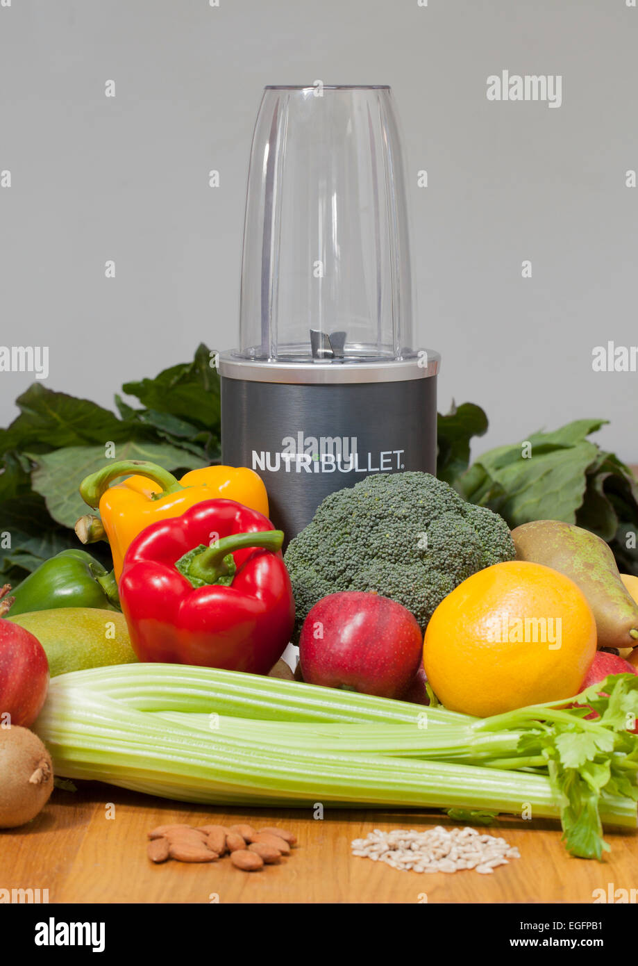Nutribullet Food Extractor with raw fruit and vegetable ready for extraction Stock Photo