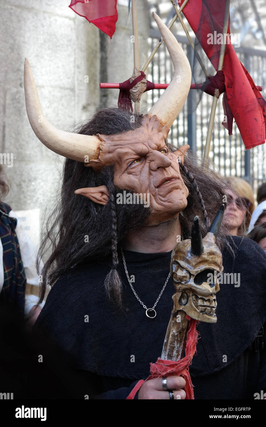 DINAN, FRANCE - JULY 2014  Man dressed up in a devil costume on Fete des remparts, a hugely popular Knights Festival Stock Photo