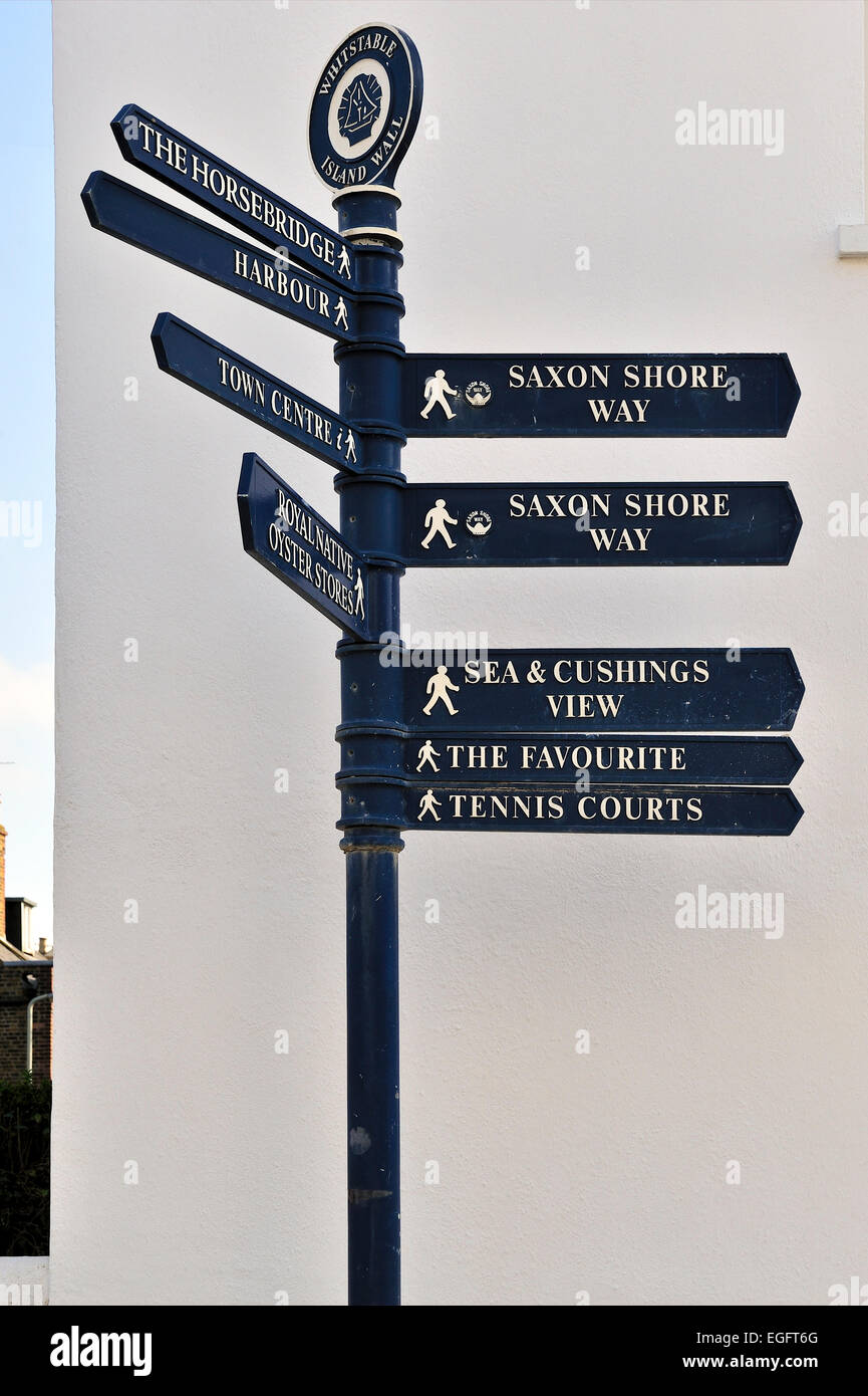 street signpost giving directions whitstable kent Stock Photo