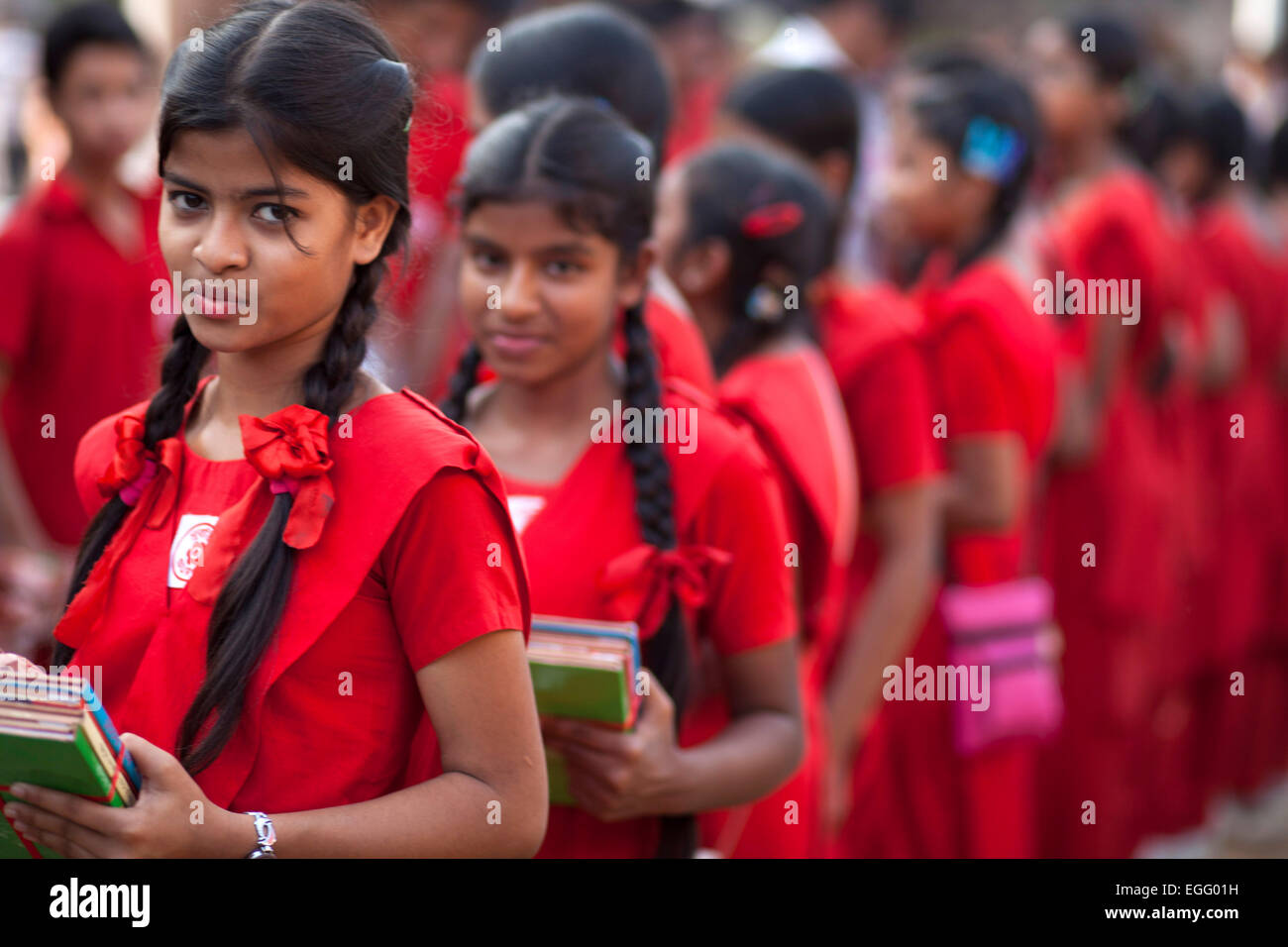 Dhaka, Bangladesh. 24th February, 2015. People from different community distributed free story book to slum children of a school on the occasion of Ekushe Book Fair in Dhaka. Credit:  zakir hossain chowdhury zakir/Alamy Live News Stock Photo