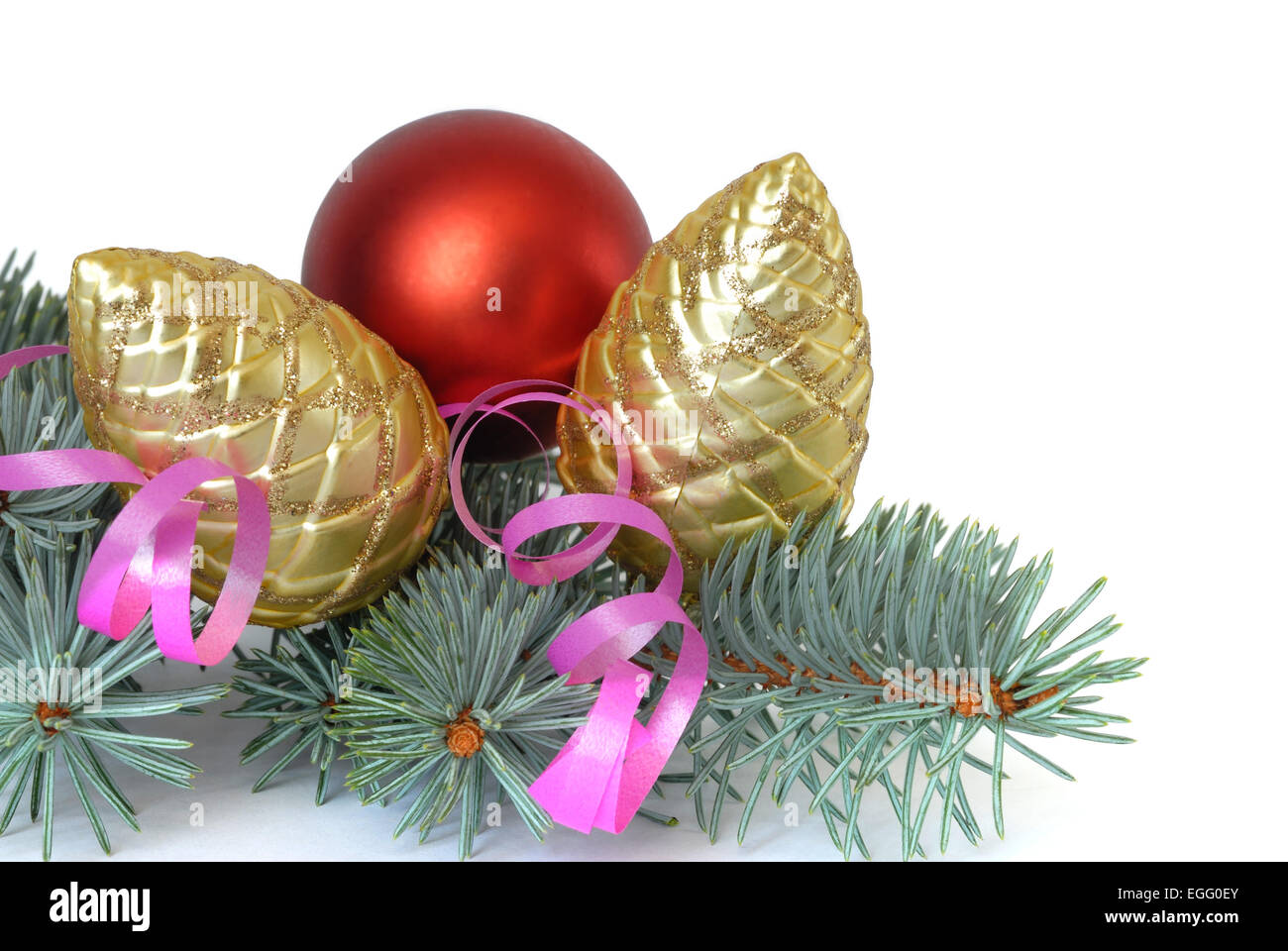 Christmas tree branch and baubles isolated on white background Stock Photo