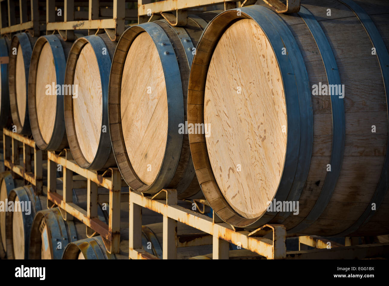 A stack of wine barrels at a vineyard Stock Photo