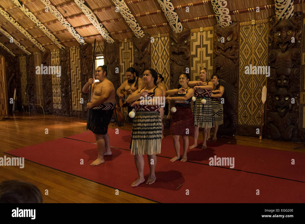 Te Pitowhenua group of performers act a traditional Maori shoe of song and dance for tourists and visitors at the Waitangi treat Stock Photo