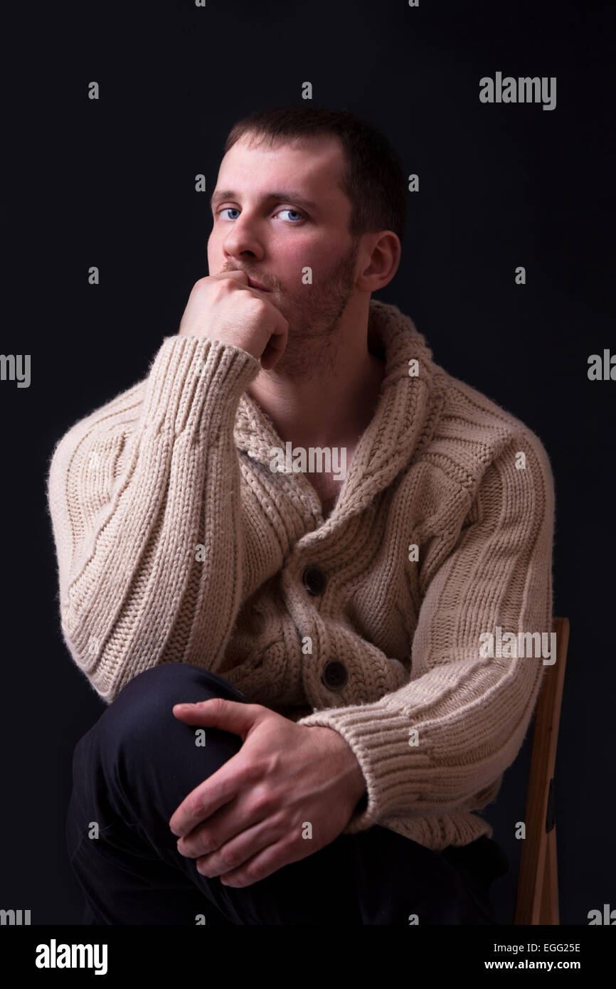 Portrait of handsome and young man in sweater Stock Photo