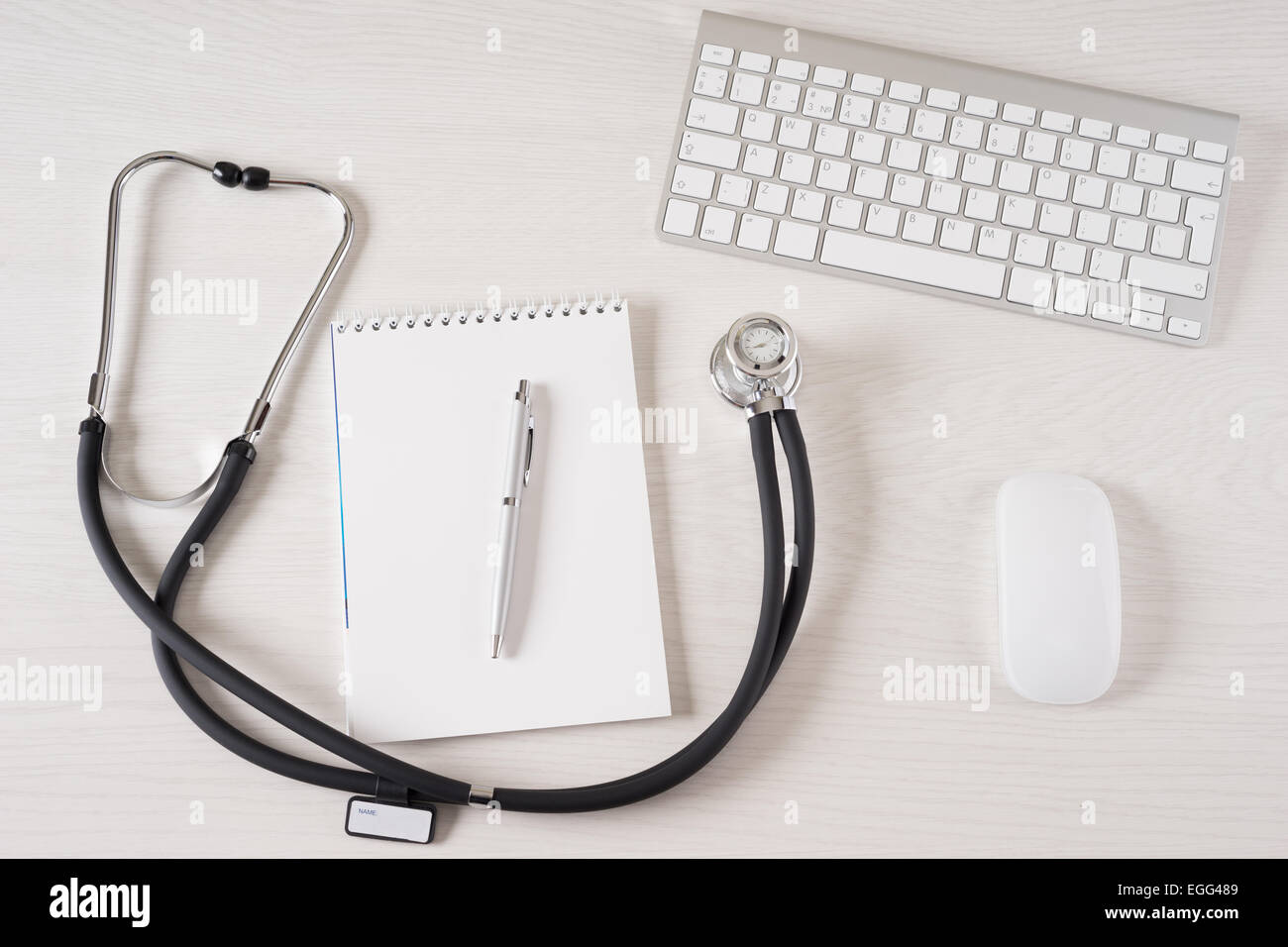 Stethoscope on doctor's desk with keyboard and pad Stock Photo - Alamy