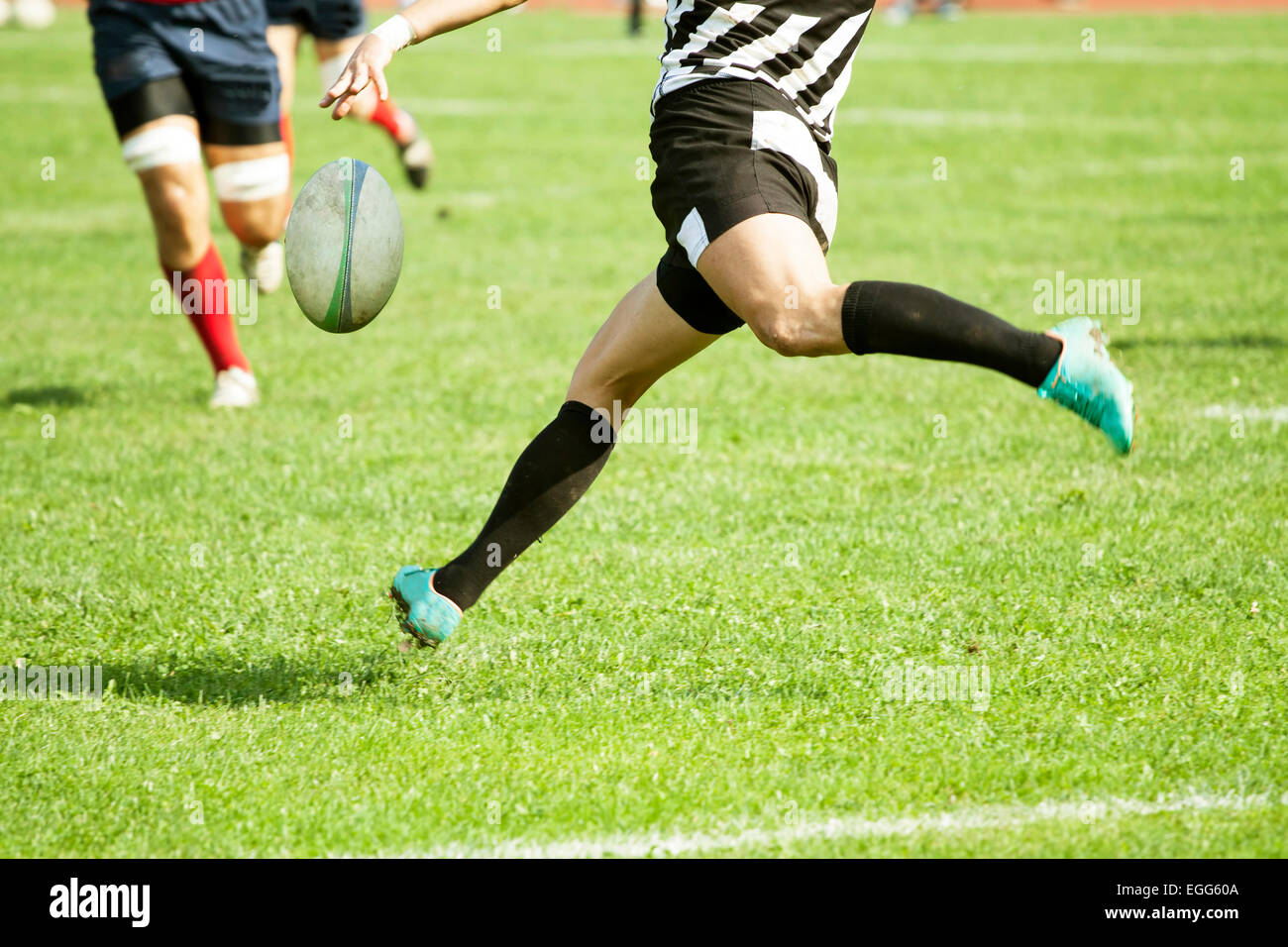 Man Kicking Ball Stock Photos & Man Kicking Ball Stock Images Alamy
