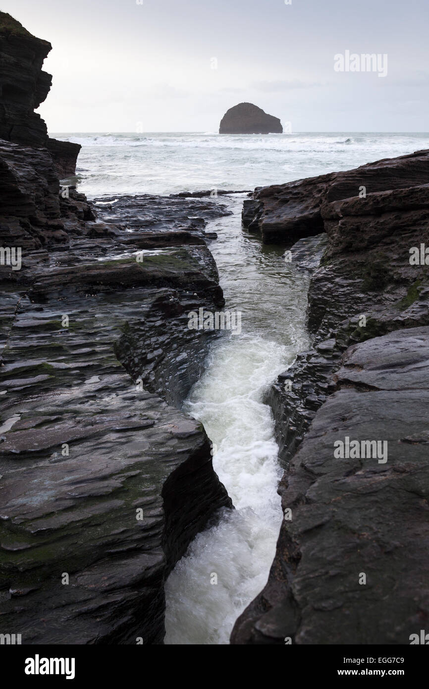 'Trebarwith Strand' stream and sea view to 'Gull Rock', Cornwall, England, UK Stock Photo