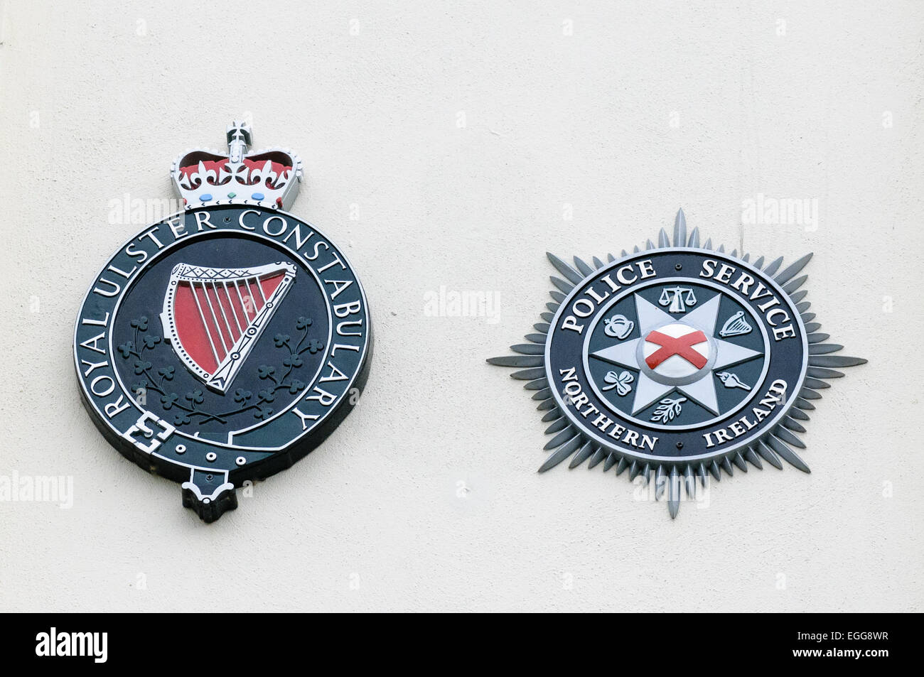 Royal Ulster Constabulary (RUC) and PSNI logos side by side Stock Photo