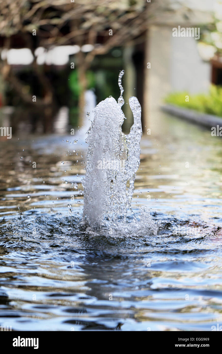 small fountain water jet photographed close up Stock Photo