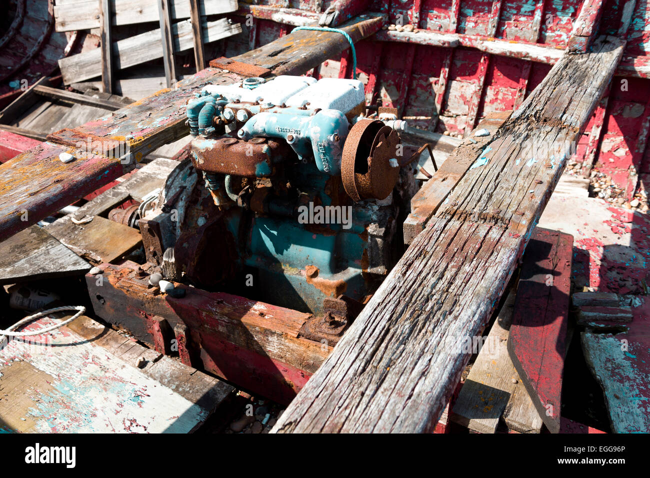 Image of a boat engine in a boat of disrepair and not seaworthy Stock Photo