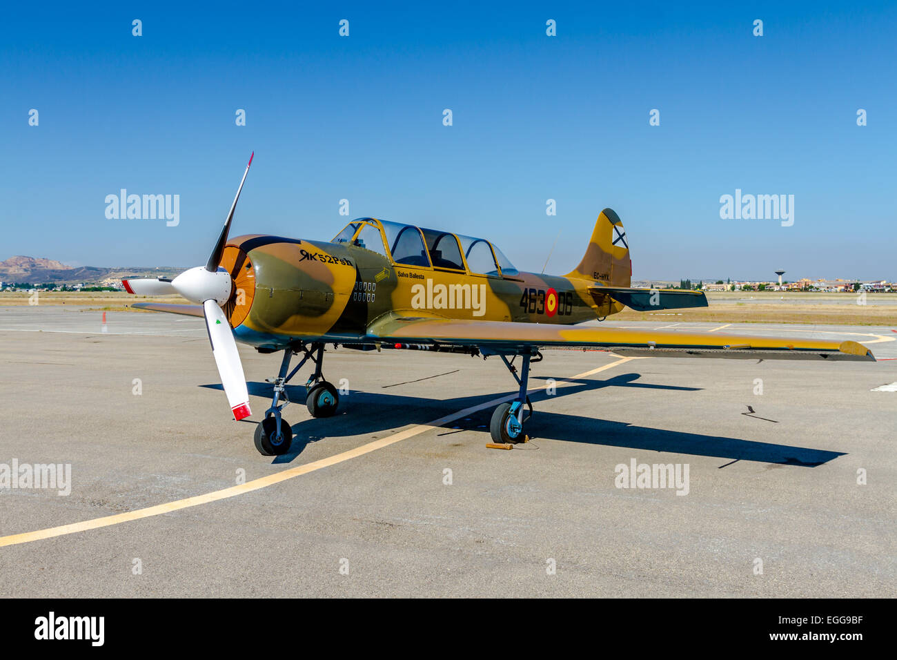 GRANADA, SPAIN-MAY 18: Airplane Yakovlev Yak-52 taking part in a exhibition on the X aniversary of the Patrulla Aspa of the airbase of Armilla on May 18, 2014, in Granada, Spain Stock Photo