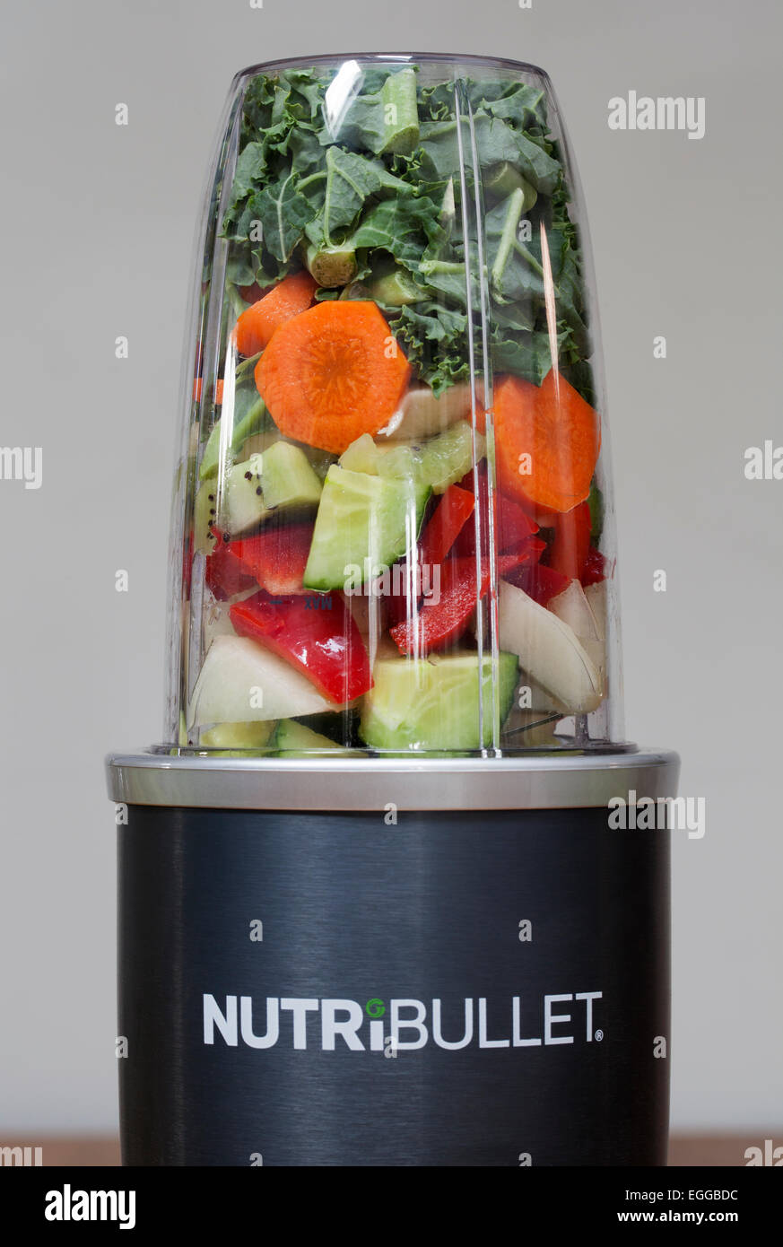 Nutribullet Food Extractor with raw fruit and vegetable ready for