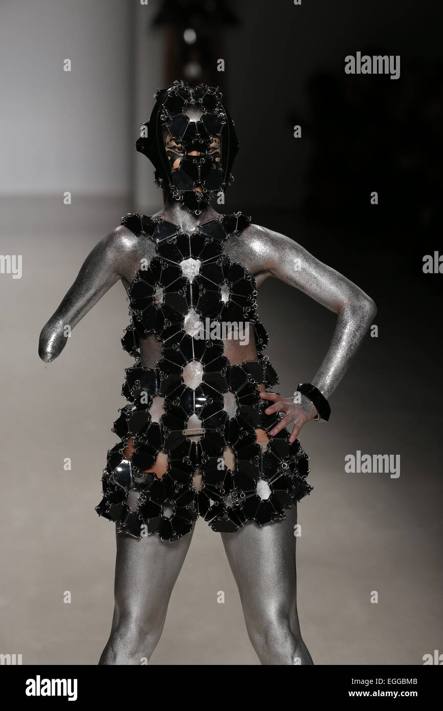 A model walks the runway wearing Antonio Urzi collection at the