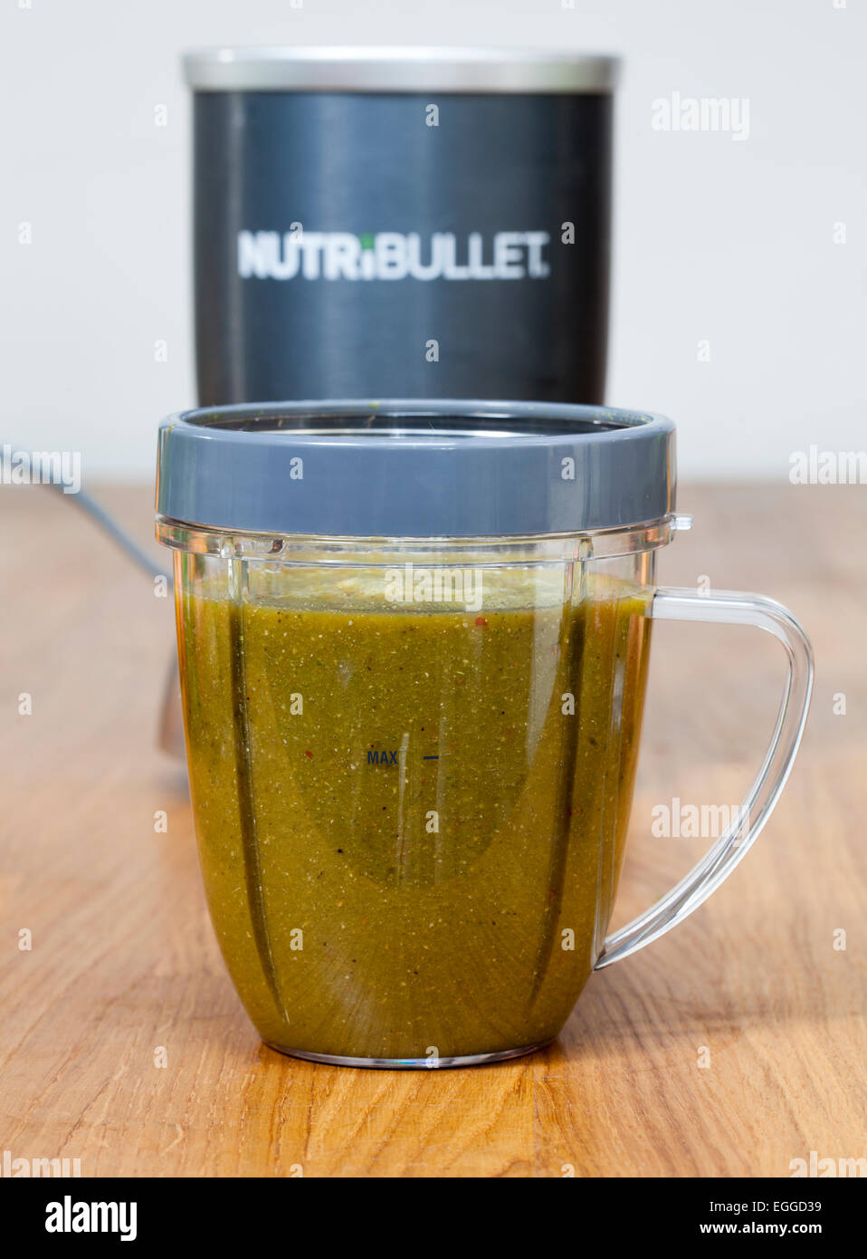 Nutribullet Food Extractor showing fruit and vegetable extraction mixture Stock Photo