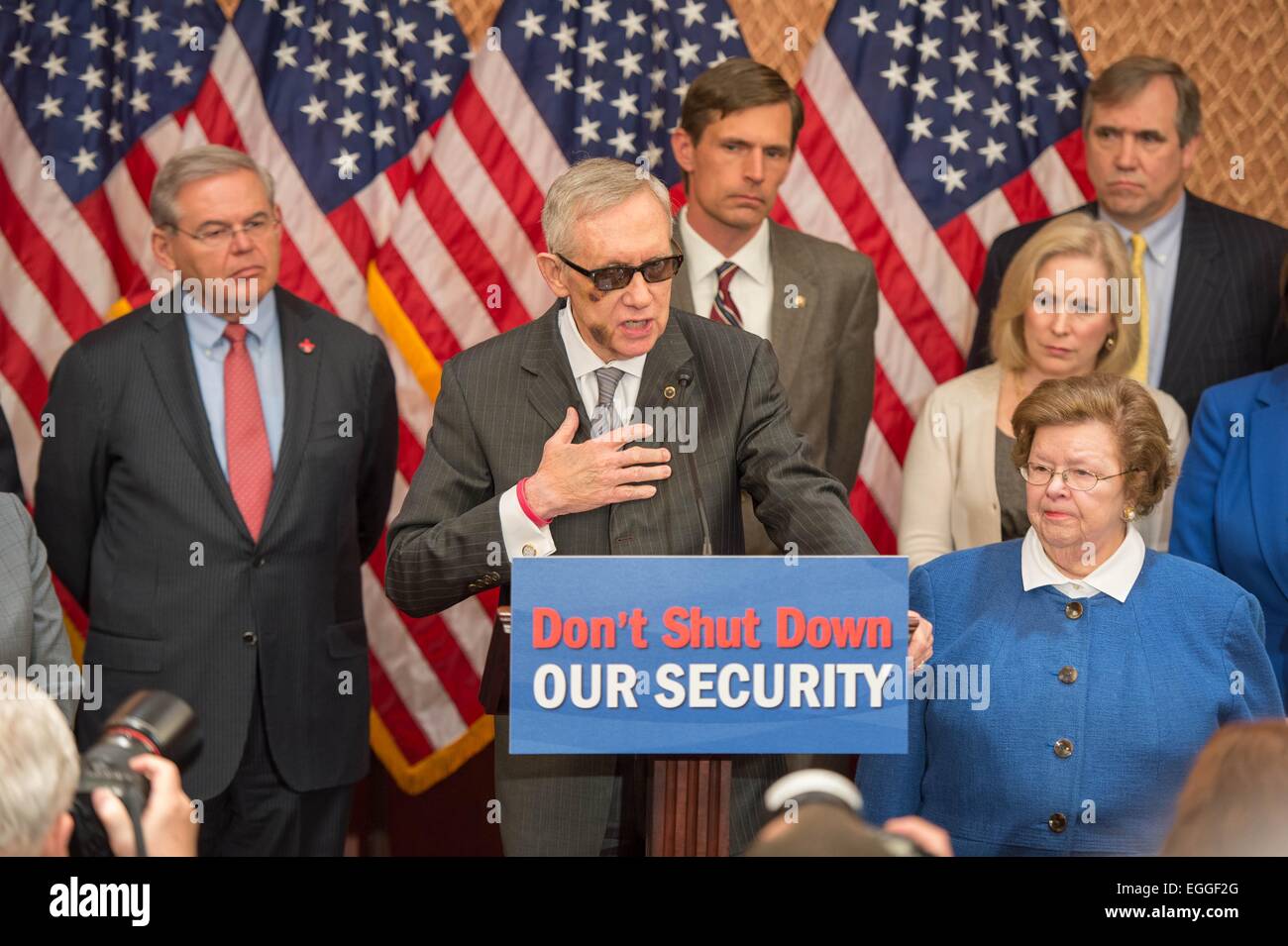 US Senate Minority Leader Senator Harry Reid joins other Senators to call for passing funding for Homeland Security blocked by Republicans over immigration issues during a press conference on Capitol Hill  February 24, 2015 in Washington, DC. Stock Photo