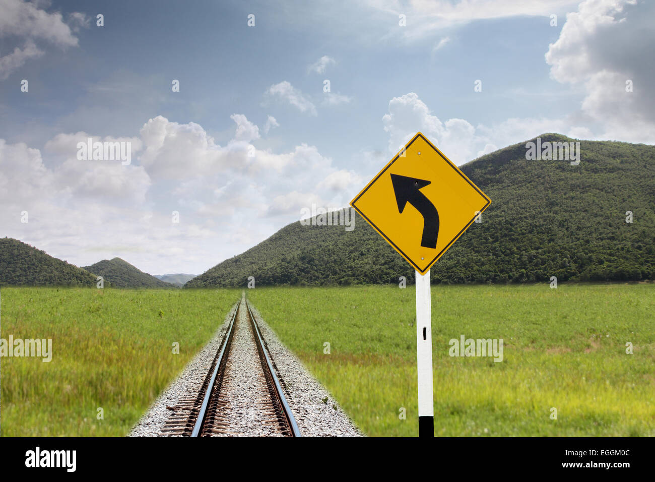 Traffic sign in pastures and rail. Stock Photo