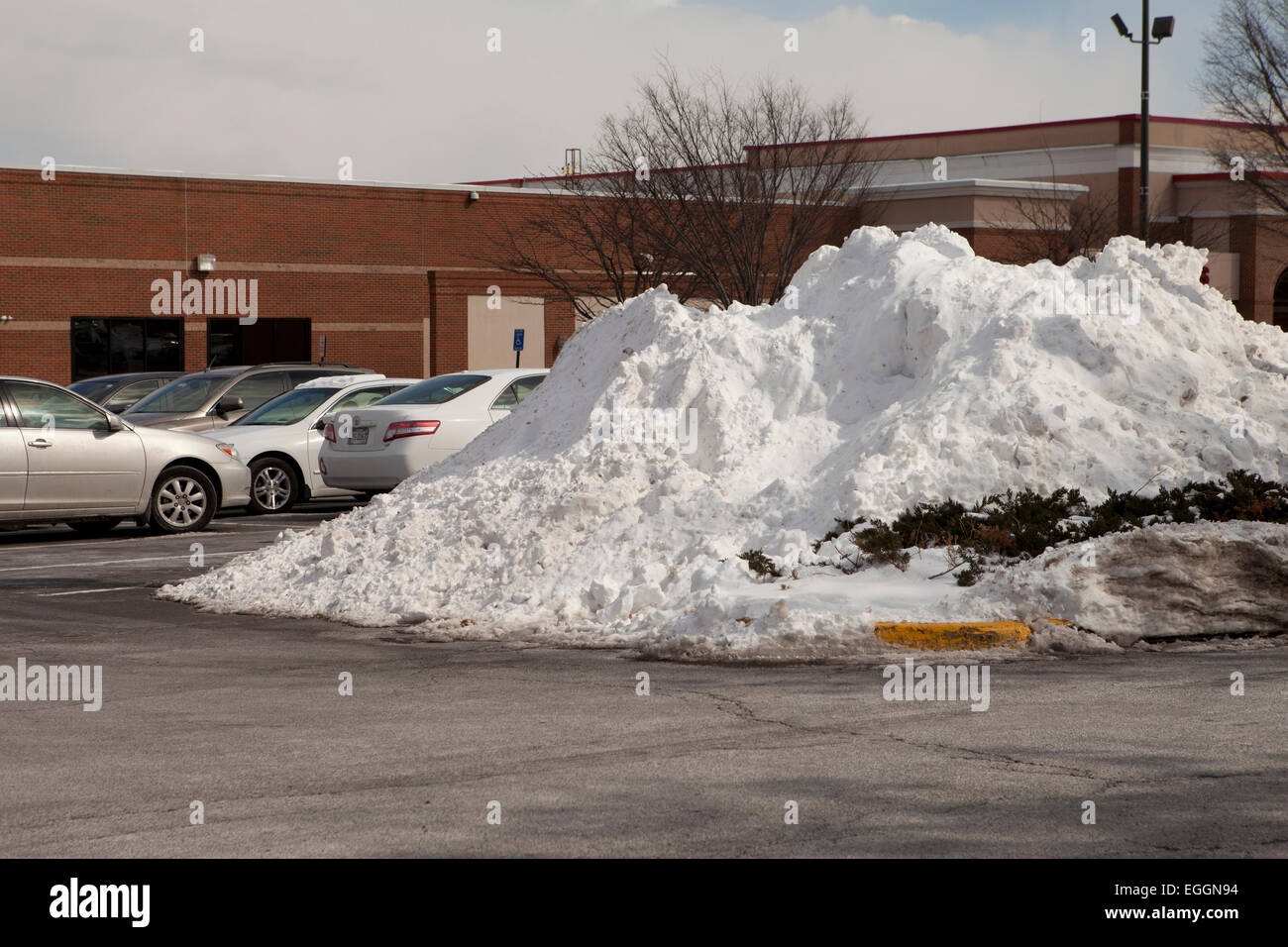 Snow pile on parking lot - Virginia USA Stock Photo - Alamy