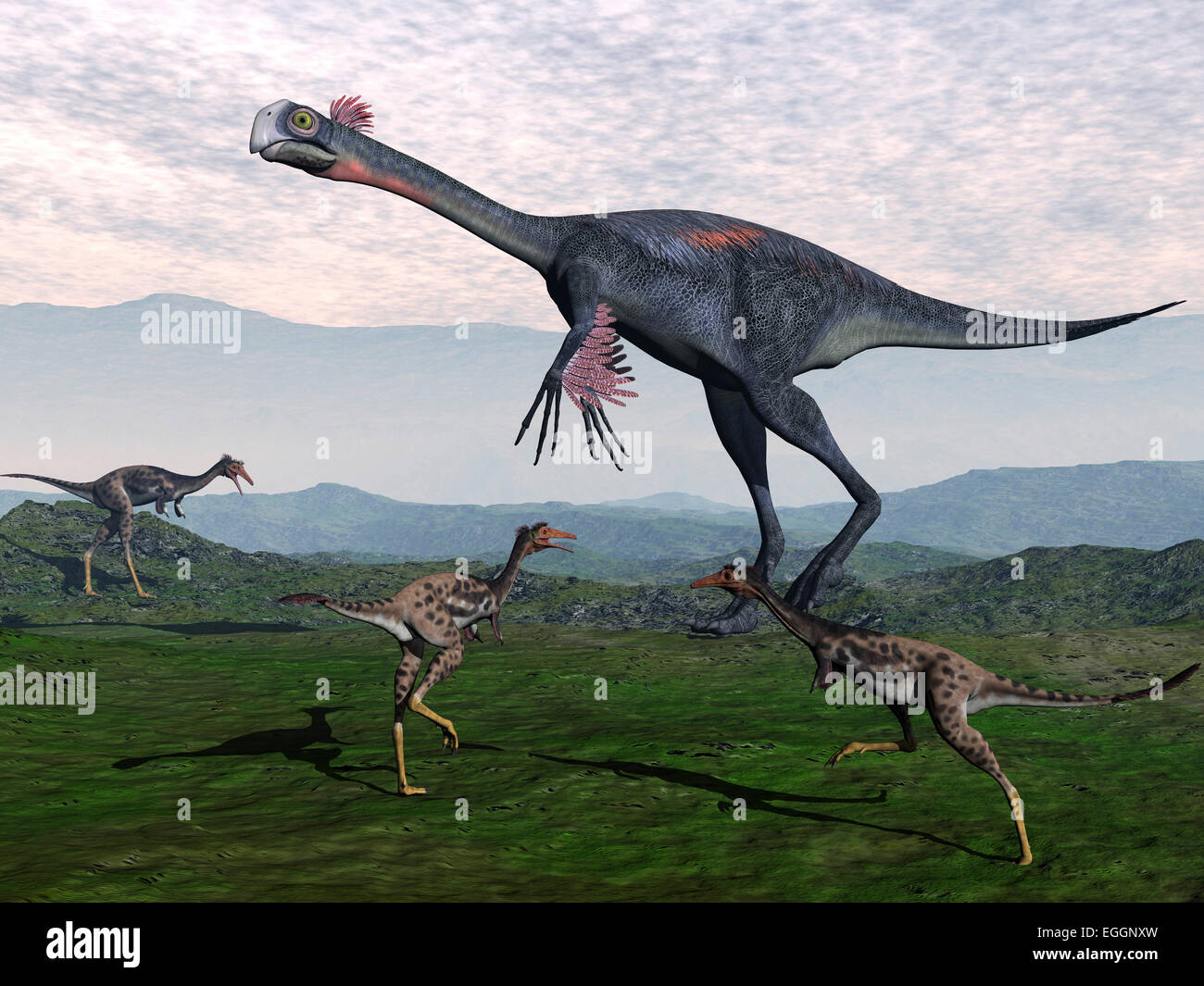 Gigantoraptor surrounded by small Mononykus dinosaurs. Stock Photo