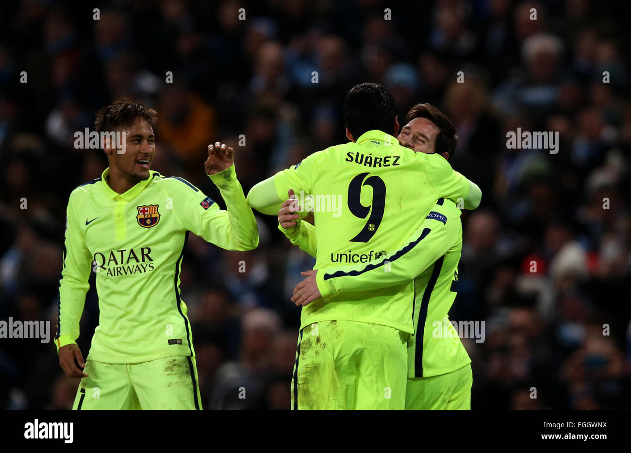 Manchester, Britain. 24th Feb, 2015. Neymar (L) and Lionel Messi (R) of Barcelona celebrate their teammate Luis Suarez's second goal during the UEFA Champions league Round of 16 first leg match between Manchester City and Barcelona at Etihad Stadium in Manchester, Britain, on Feb. 24, 2015. Barcelona won 2-1. Credit:  Han Yan/Xinhua/Alamy Live News Stock Photo