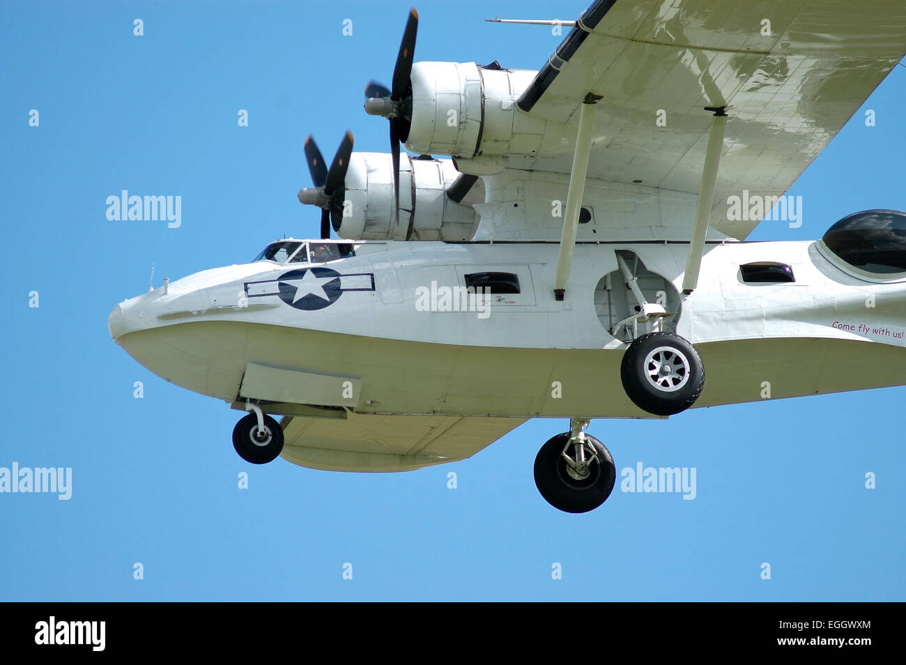 PBY Catalina seaplane in World War II U.S. Navy colors landing at