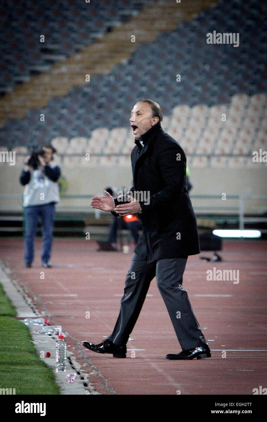 Tehran, Iran. 24th Feb, 2015. Hamid Derakhshan, head coach of Iran's Persepolis, reacts during the Asian Champions League Group A football match against Qatar's Lekhwiya at Azadi Stadium in Tehran, Iran, on Feb. 24, 2015. Persepolis won 3-0. © Ahmad Halabisaz/Xinhua/Alamy Live News Stock Photo