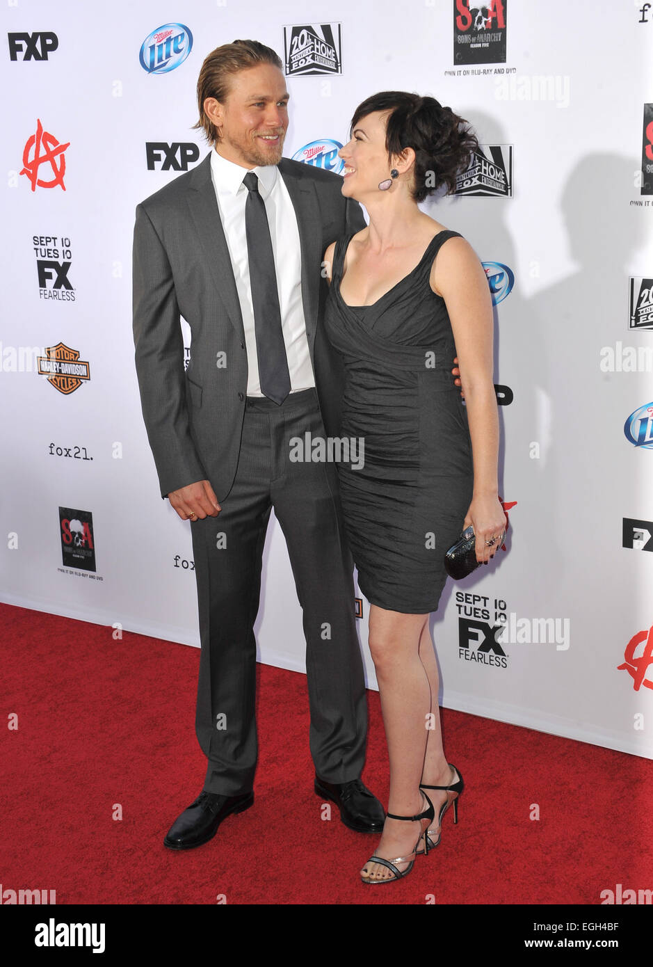 LOS ANGELES, CA - SEPTEMBER 7, 2013: Charlie Hunnam & Maggie Siff at the season 6 premiere of 'Sons of Anarchy' at the Dolby Theatre, Hollywood. Stock Photo