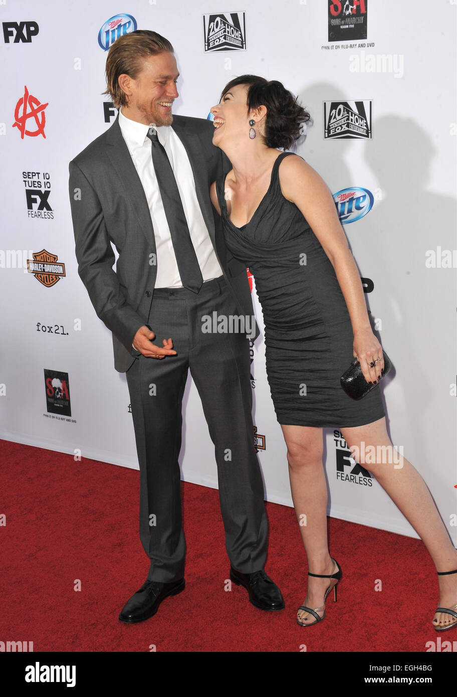 LOS ANGELES, CA - SEPTEMBER 7, 2013: Charlie Hunnam & Maggie Siff at the season 6 premiere of 'Sons of Anarchy' at the Dolby Theatre, Hollywood. Stock Photo