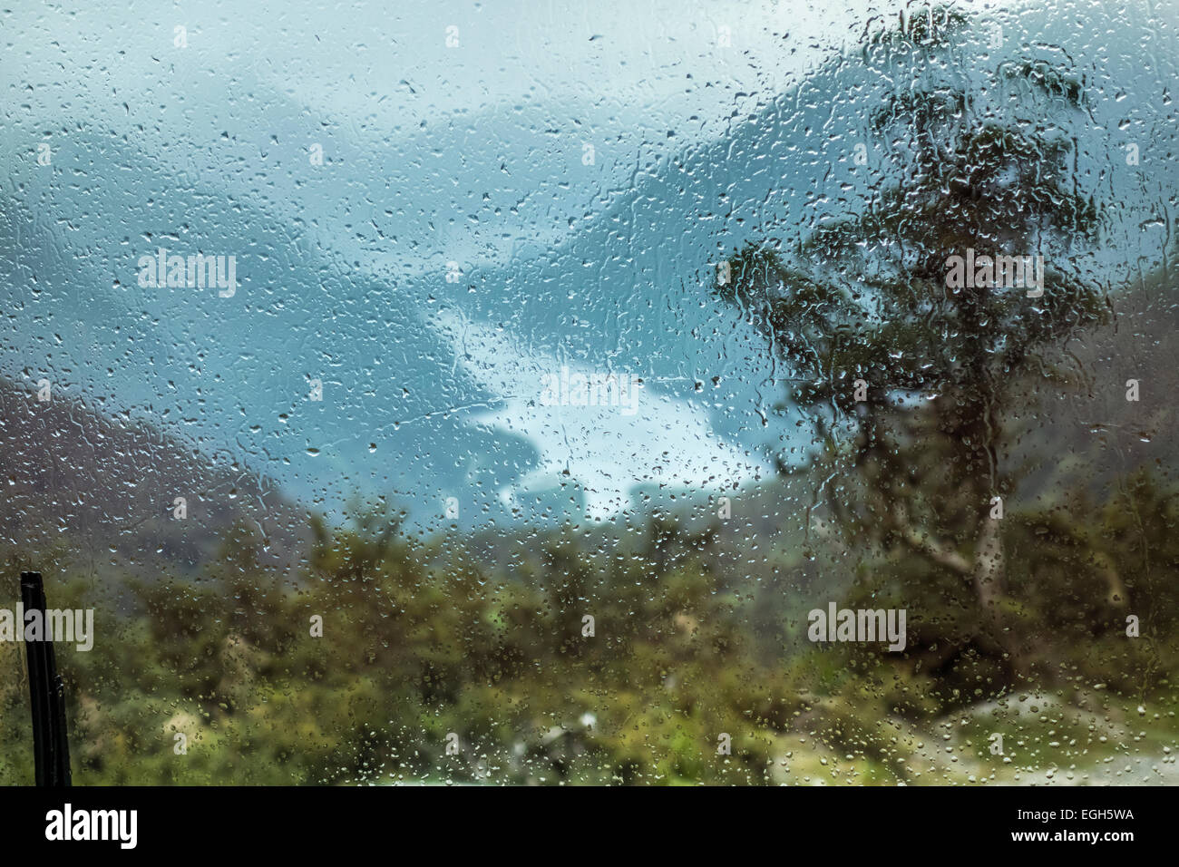 Doubtful Sound in the rain. View from Wilmot Pass in Fiordland National Park New Zealand. One of the wettest places on Earth. Stock Photo