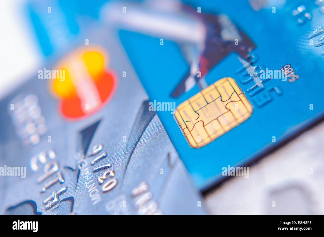 Credit cards and cash close-up on a white background Stock Photo - Alamy