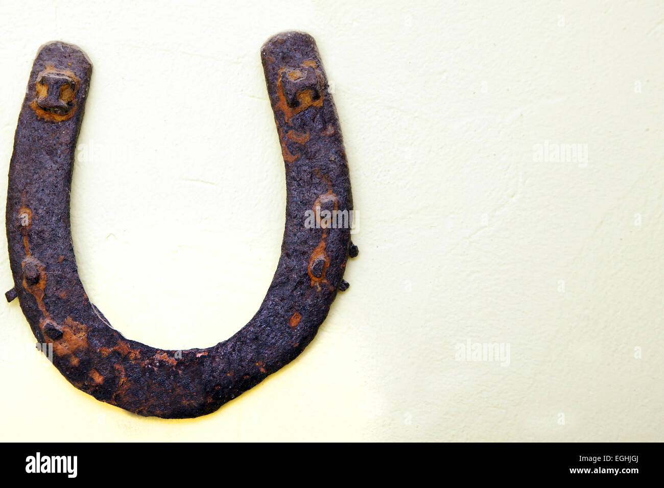 Vintage Rusted Horseshoe On Wall Above Door Stock Photo 79063730