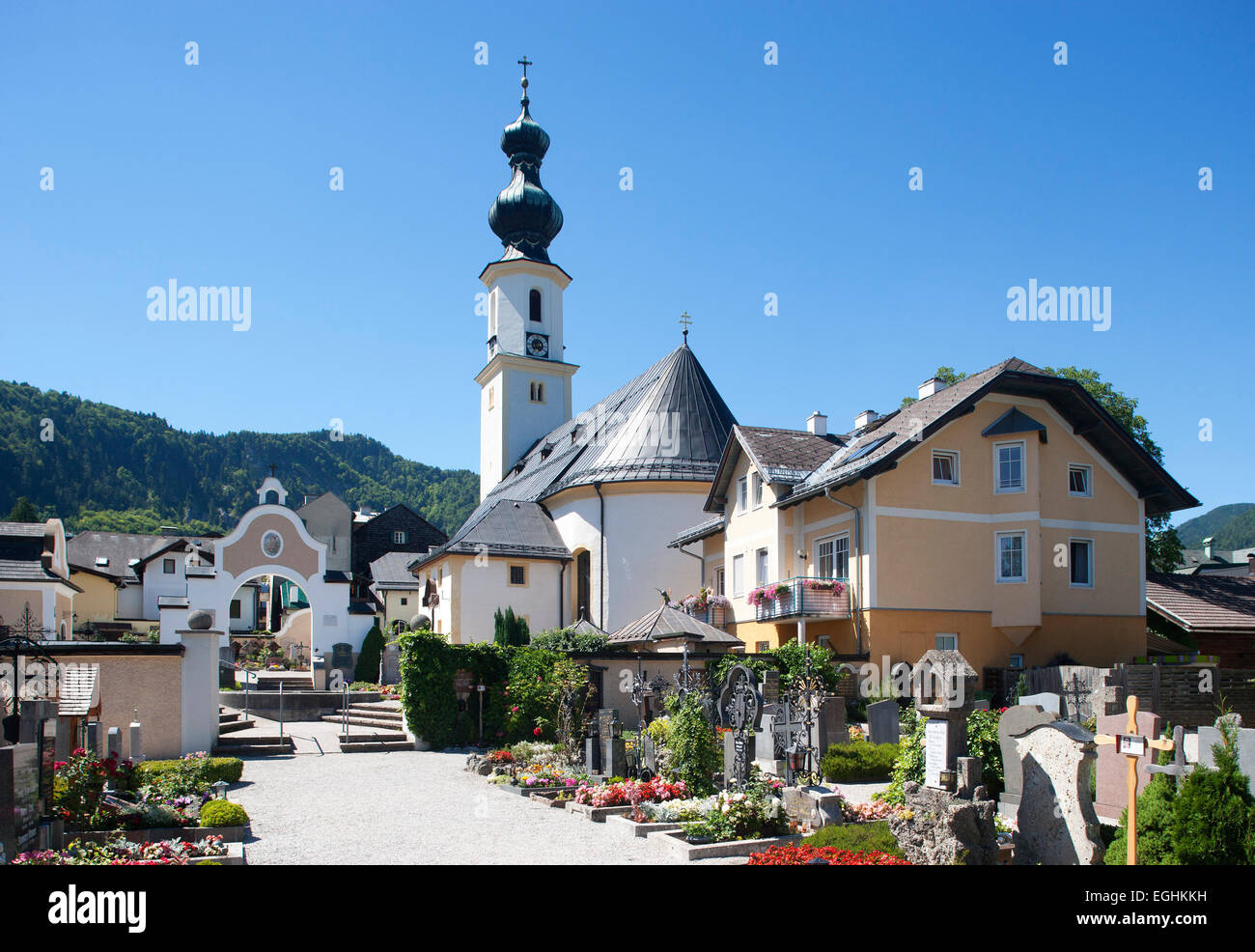 Cemetery with the Parish Church, St. Gilgen, Salzkammergut, Salzburg State, Austria Stock Photo