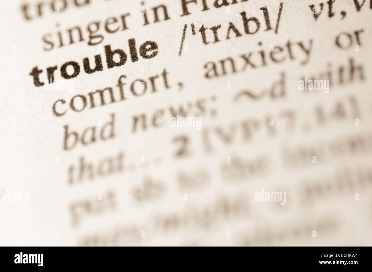 Definition of word trouble in dictionary Stock Photo