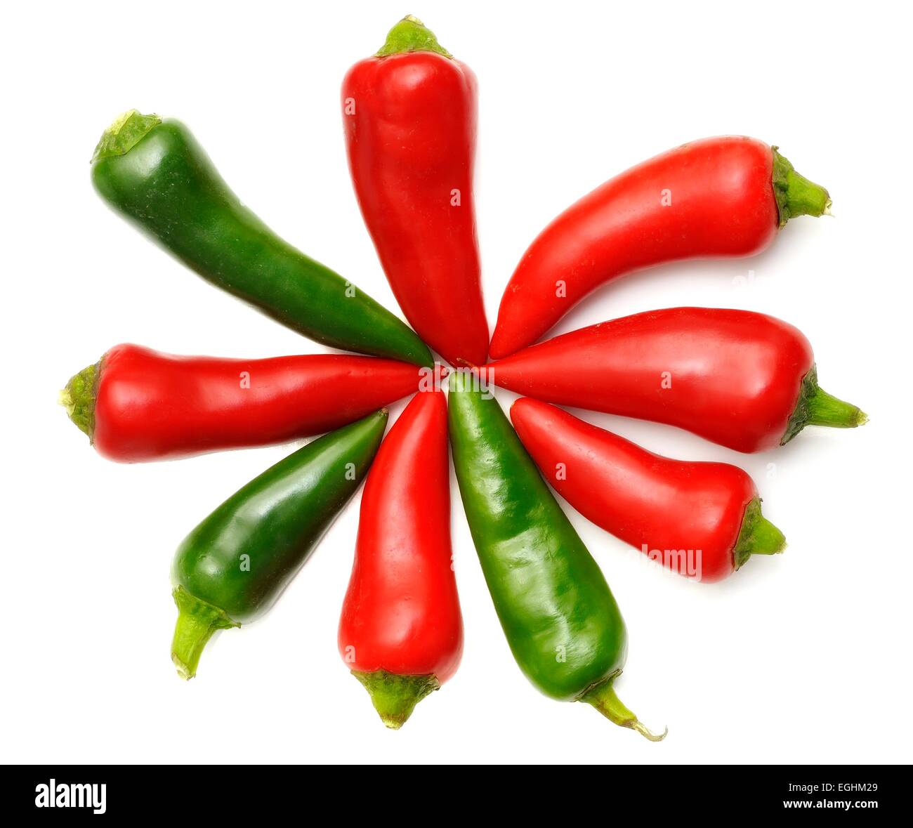 Mixed chili peppers on a white background Stock Photo