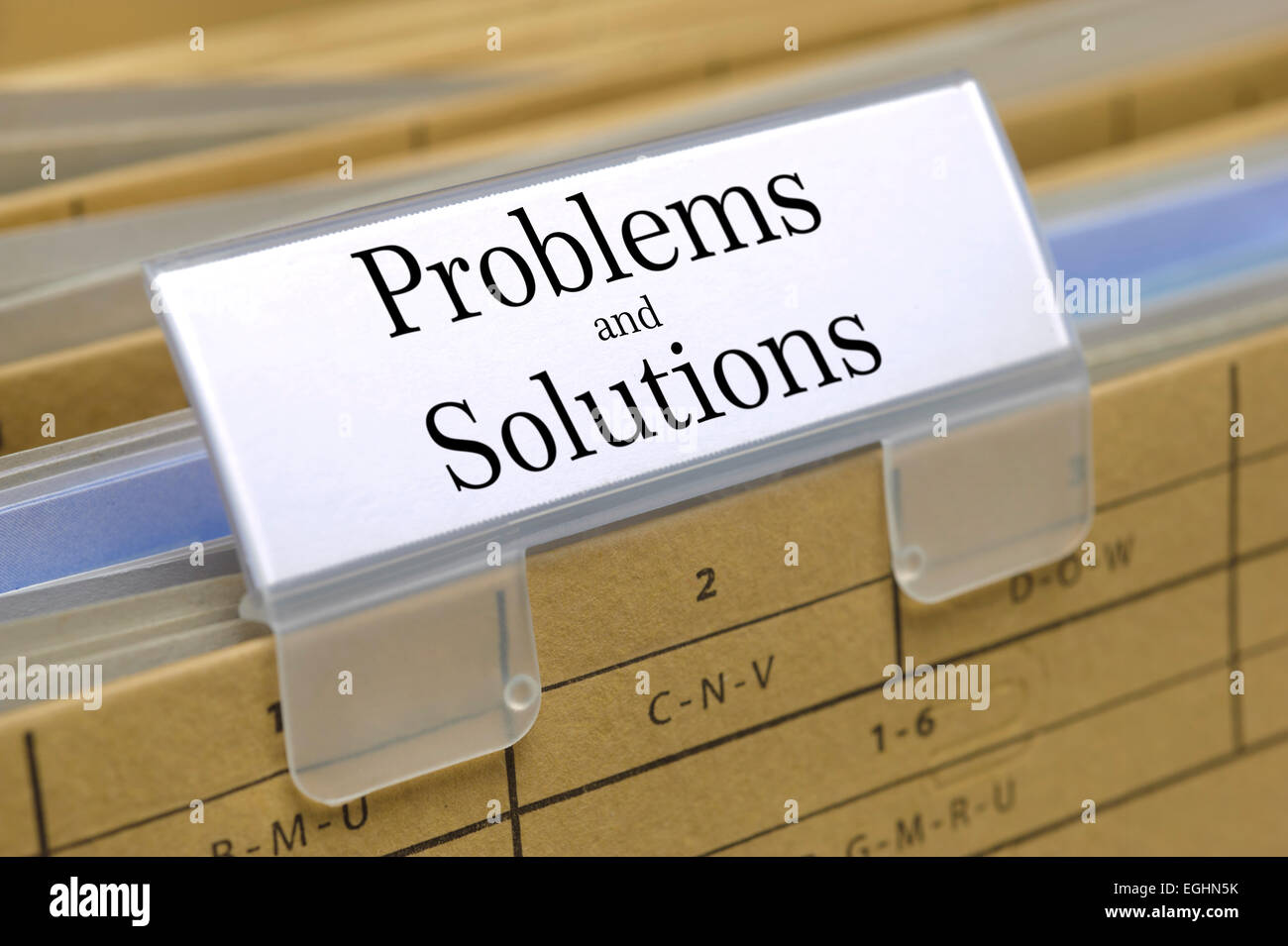 problems and solutions printed on file folder Stock Photo