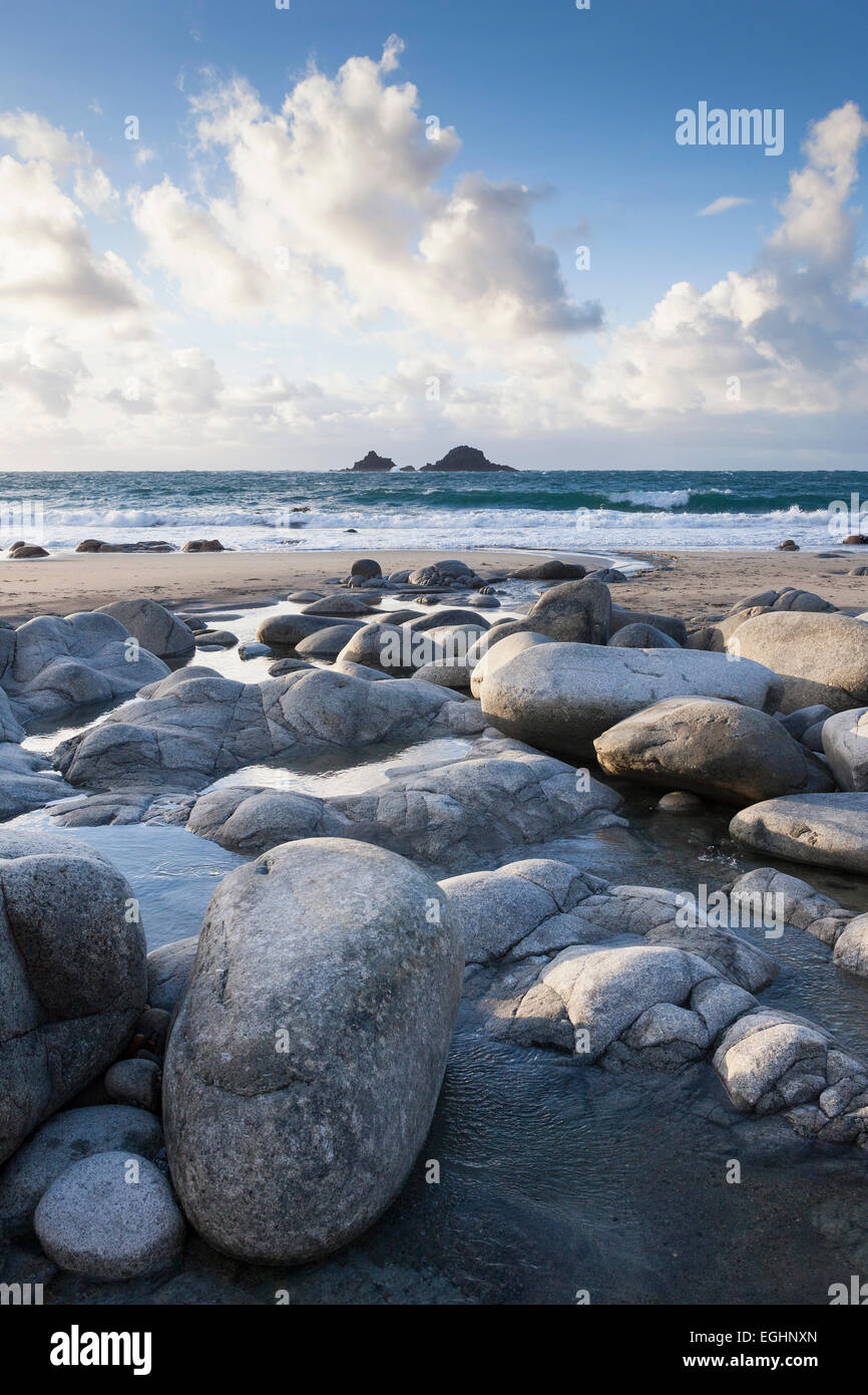 Rocks and boulders on 'Porth Nanven' beach with sea view to the Brisons, 'Cot Valley', Cornwall, England, UK Stock Photo