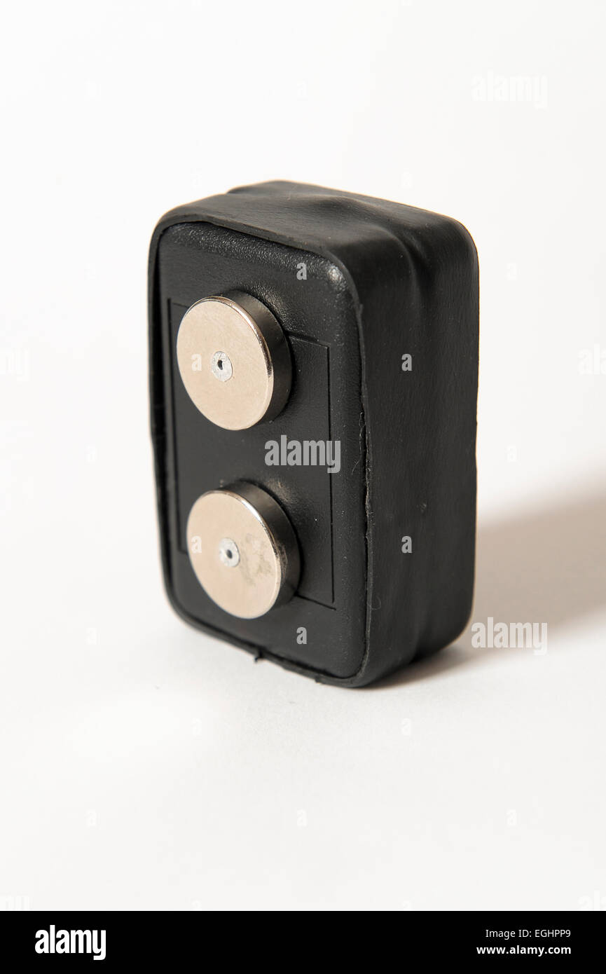 A magnetic tracker that fits on a car and can be tracked on a website ...