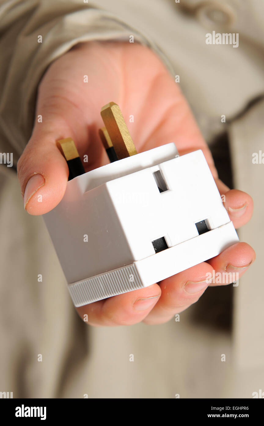 A transmitting spy plug adapter. This can be hidden in a room and transmit peoples conversations. Stock Photo