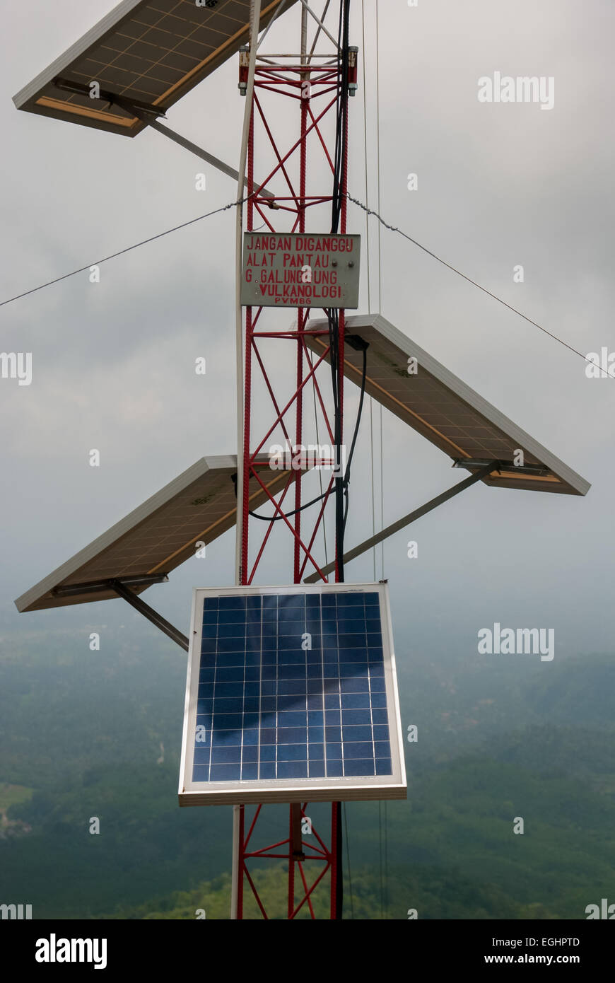 Solar cells and volcano activity monitoring instruments atop Mount Galunggung, Java, Indonesia. Stock Photo