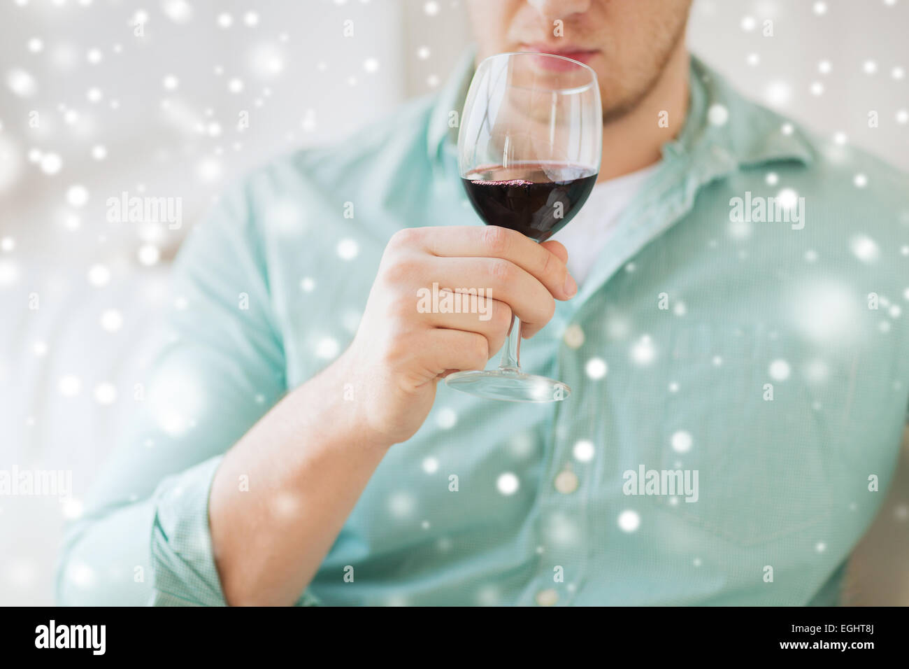 Man holding up red wine glass hi-res stock photography and images - Alamy