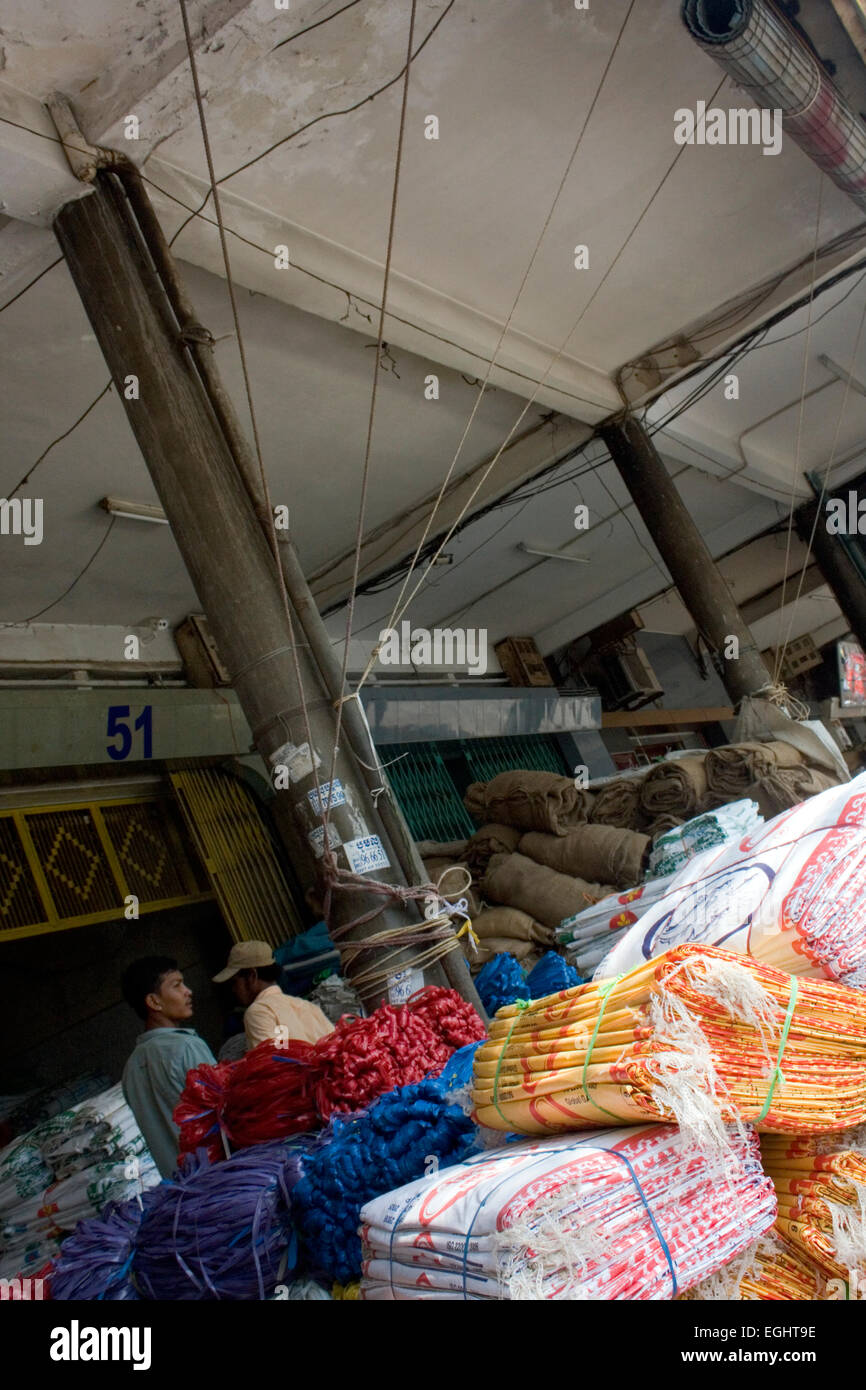 Empty rice sacks are available for sale at bag shop in Penh, Cambodia. Stock Photo